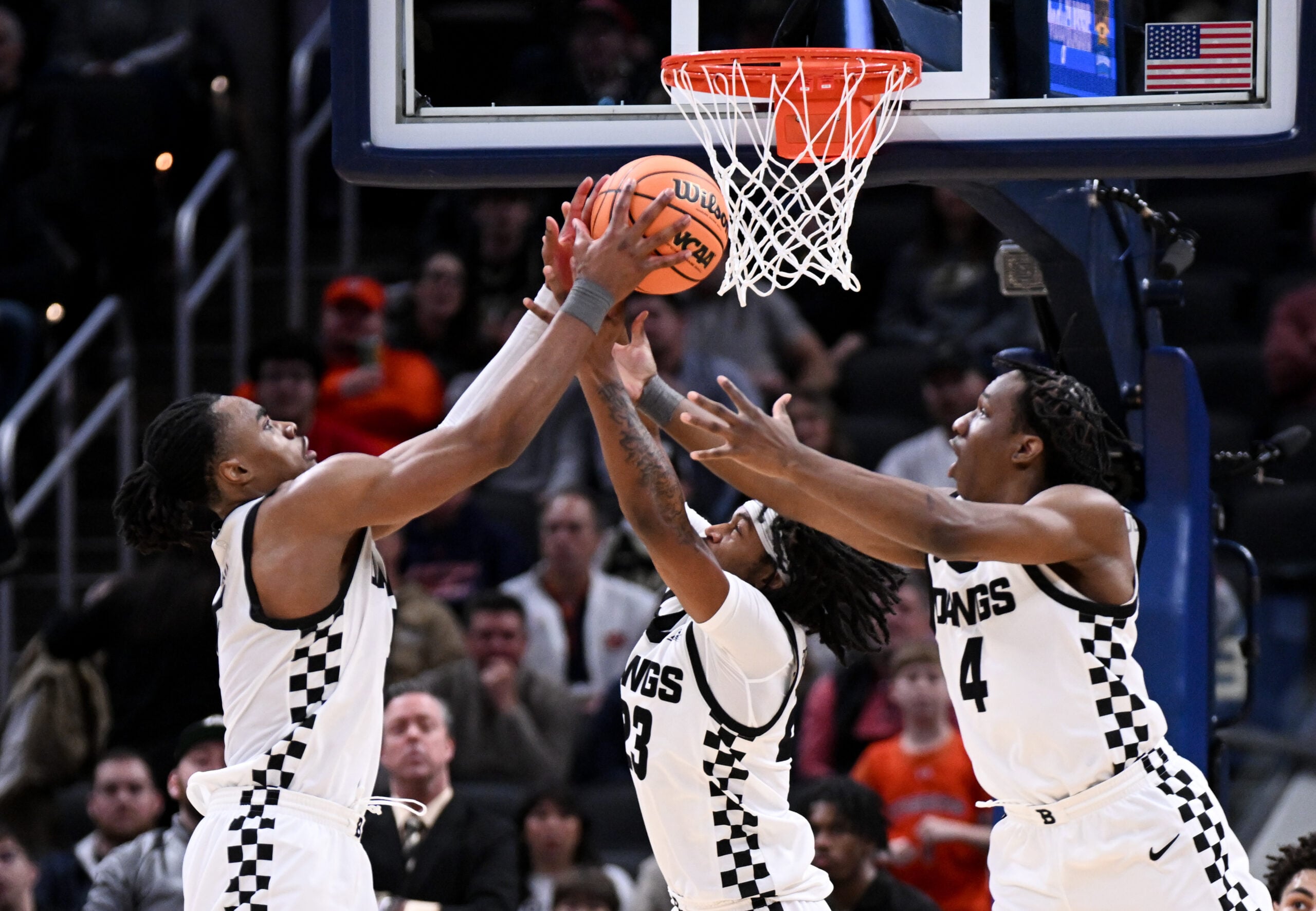 Dec 20, 2025; Indianapolis, Indiana, USA; Butler Bulldogs forward Michael Ajayi (5) and Butler Bulldogs guard Azavier Robinson (23) go for a rebound during the second half against the Northwestern Wildcats at Gainbridge Fieldhouse. Mandatory Credit: Robert Goddin-Imagn Images