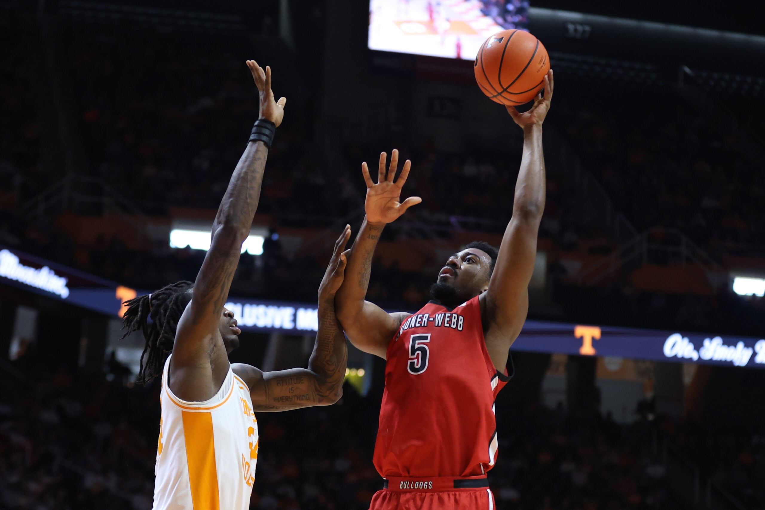 Dec 21, 2025; Knoxville, Tennessee, USA; Gardner-Webb Runnin' Bulldogs forward Jacob Hogarth (5) goes to the basket against the Tennessee Volunteers during the second half at Thompson-Boling Arena at Food City Center. Mandatory Credit: Randy Sartin-Imagn Images