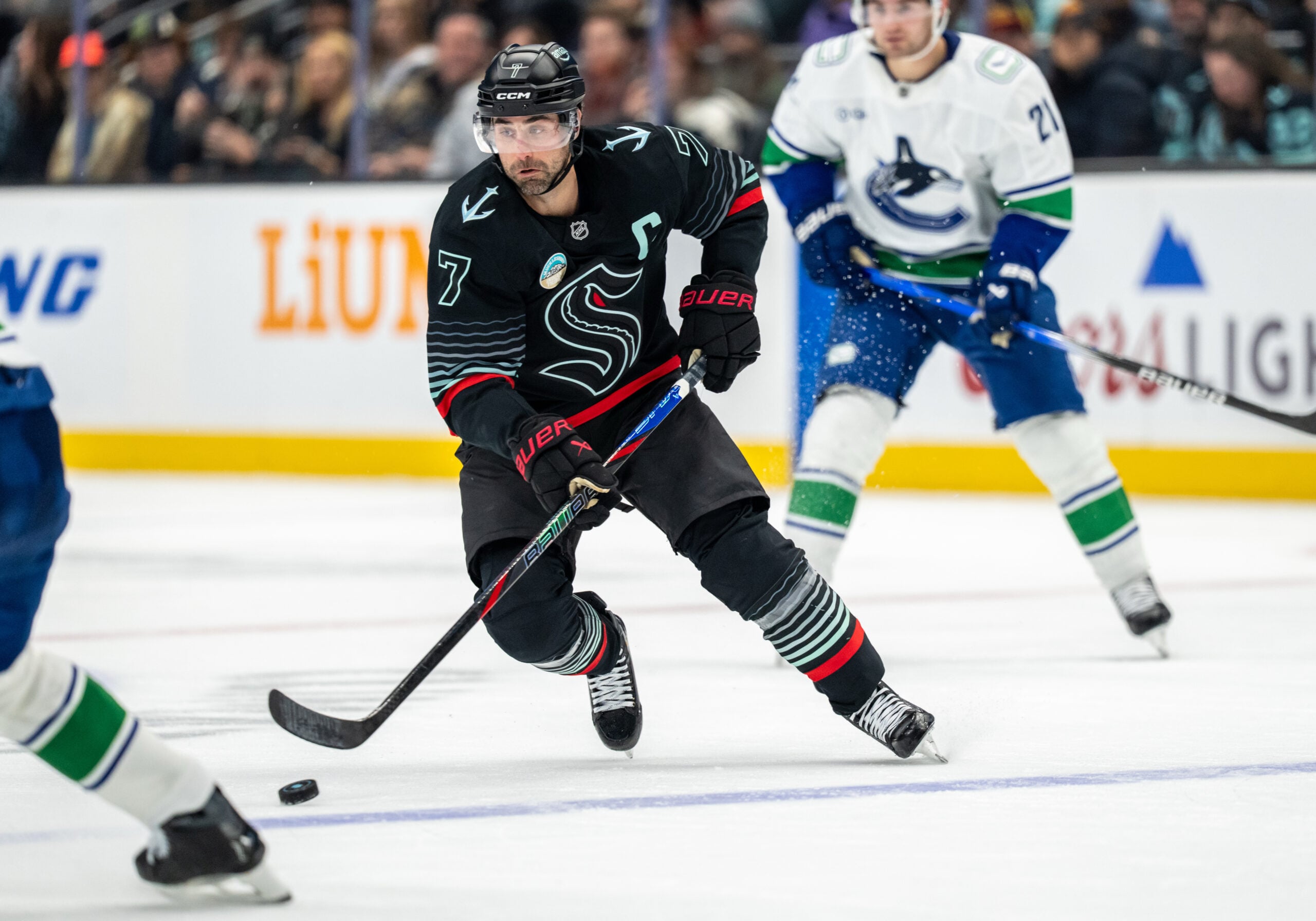 Dec 29, 2025; Seattle, Washington, USA; Seattle Kraken forward Jordan Eberle (7) skates with the puck during the third period against the Vancouver Canucks at Climate Pledge Arena. Mandatory Credit: Stephen Brashear-Imagn Images