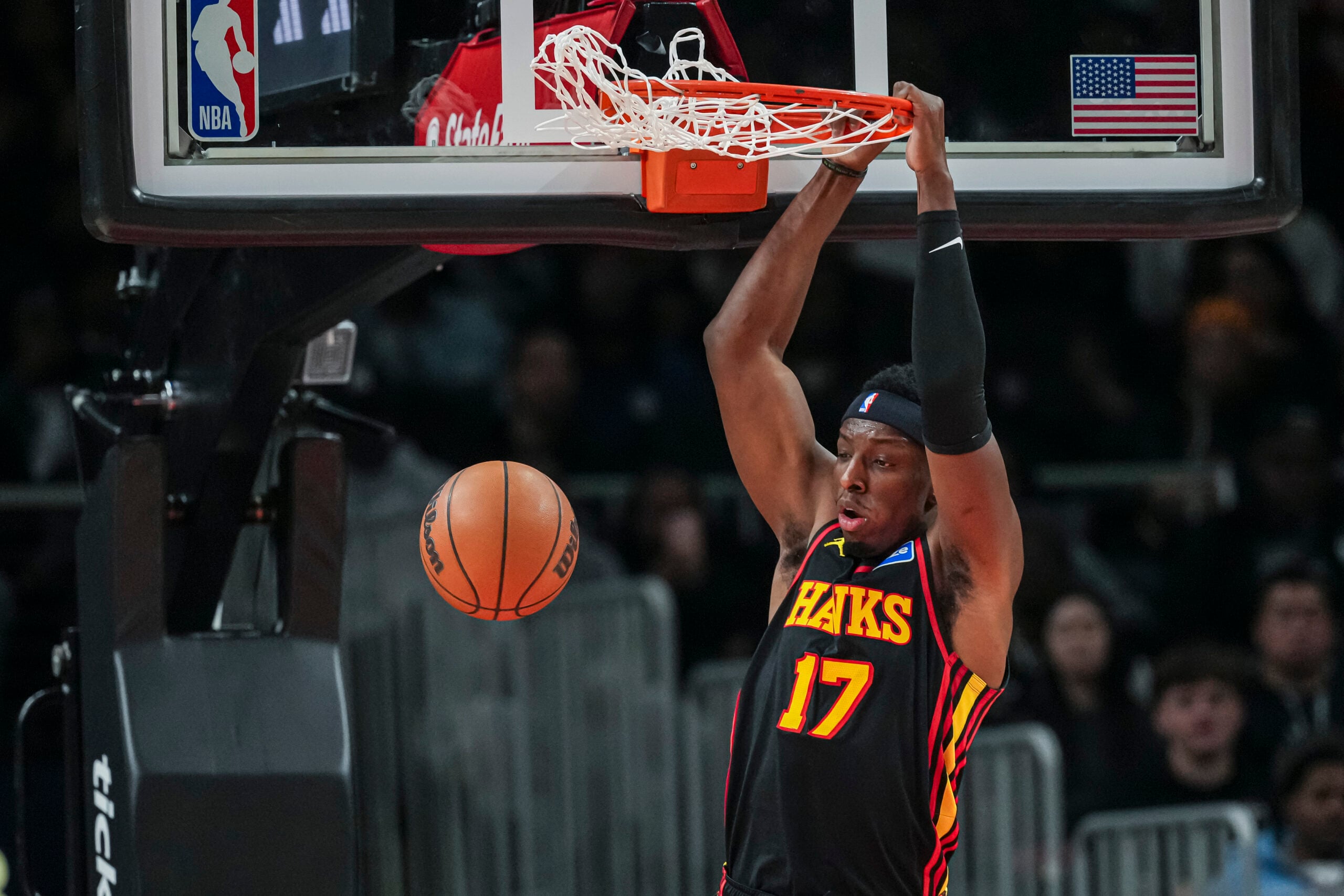 Dec 31, 2025; Atlanta, Georgia, USA; Atlanta Hawks forward Onyeka Okongwu (17) dunks the ball against the Minnesota Timberwolves during the second half at State Farm Arena. Mandatory Credit: Dale Zanine-Imagn Images