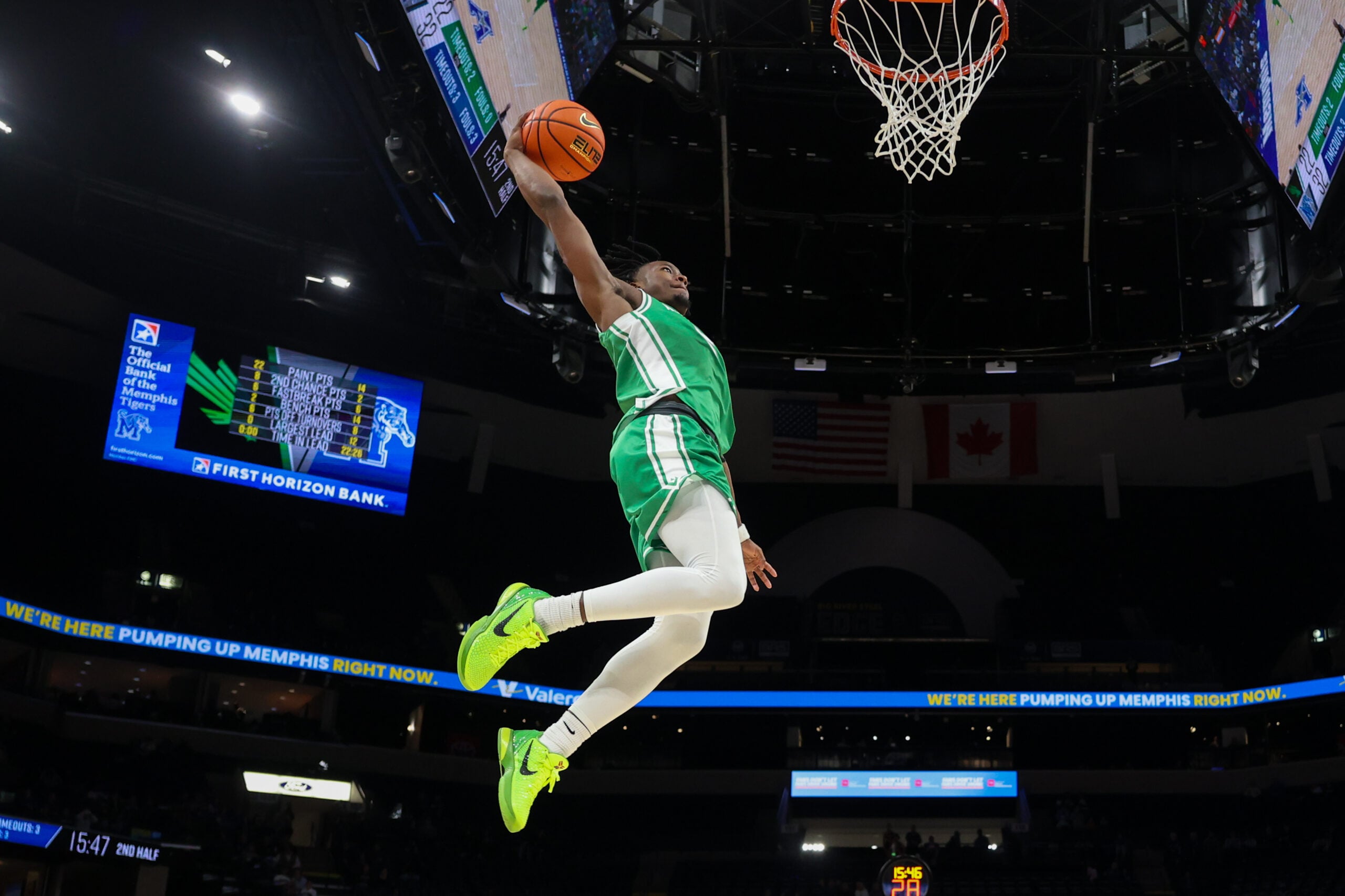 Dec 31, 2025; Memphis, Tennessee, USA; North Texas Mean Green guard David Terrell Jr. (5) dunks the ball against the Memphis Tigers during the second half at FedExForum. Mandatory Credit: Wesley Hale-Imagn Images