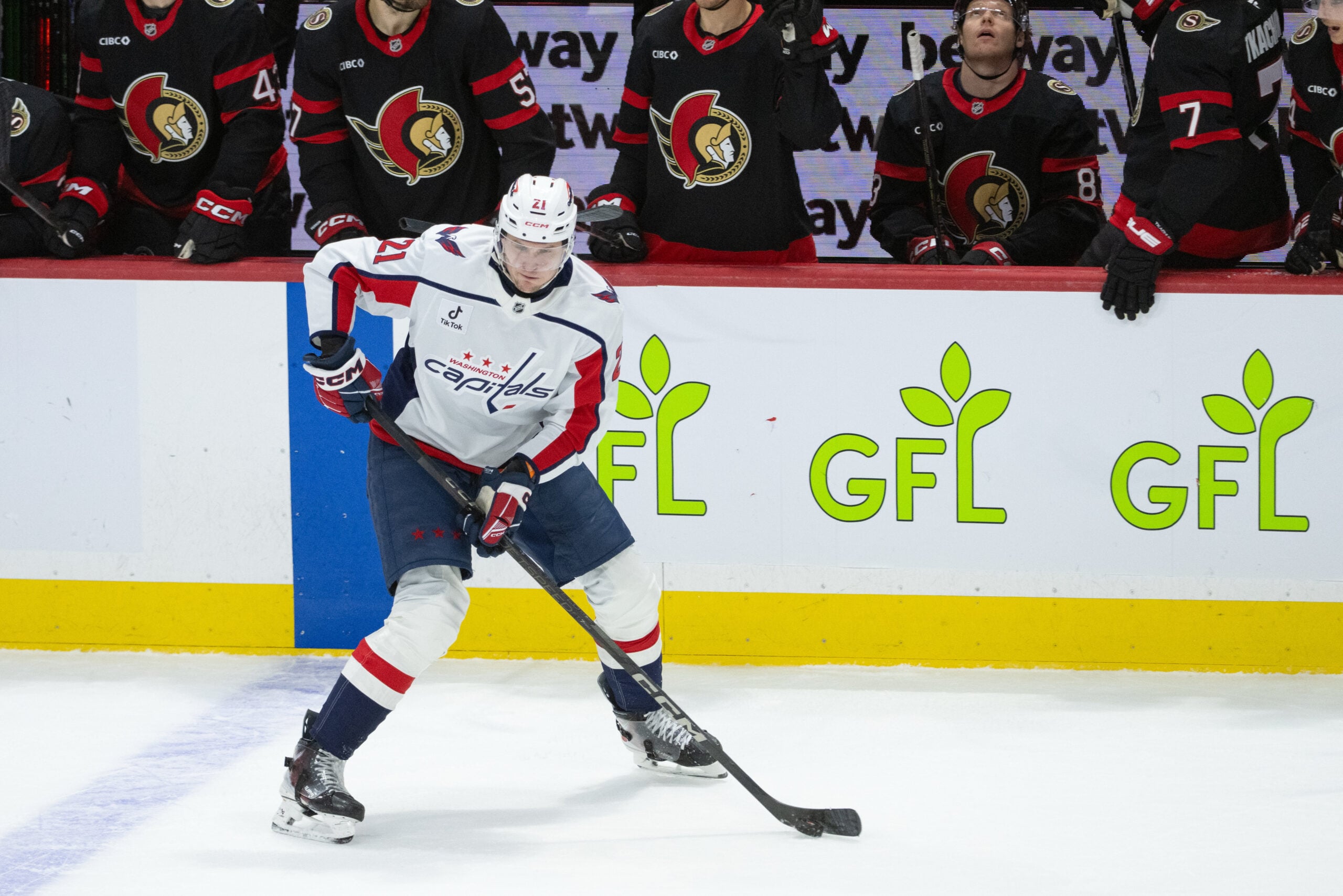 Jan 1, 2026; Ottawa, Ontario, CAN; Washington Capitals center Aliaksei Protas (21) controls the puck in the third period against the Ottawa Senators at the Canadian Tire Centre. Mandatory Credit: Marc DesRosiers-IMAGN Images