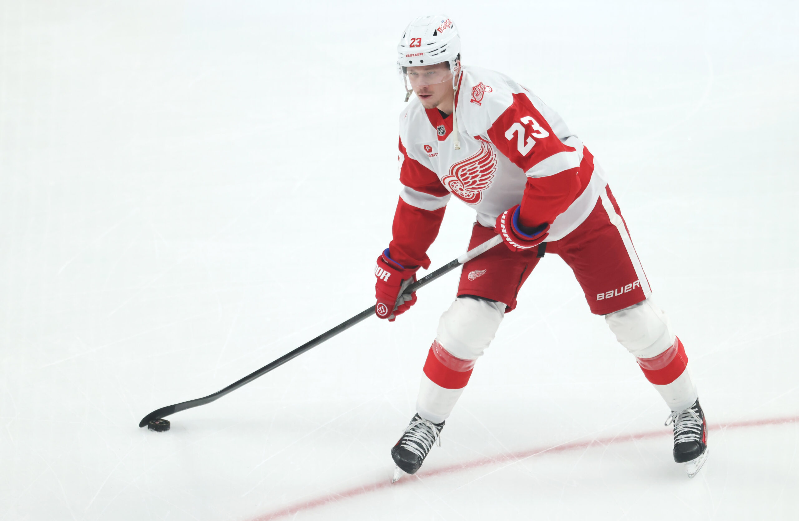 Jan 1, 2026; Pittsburgh, Pennsylvania, USA;  Detroit Red Wings left wing Lucas Raymond (23) warms up against the Pittsburgh Penguins at PPG Paints Arena. Mandatory Credit: Charles LeClaire-Imagn Images