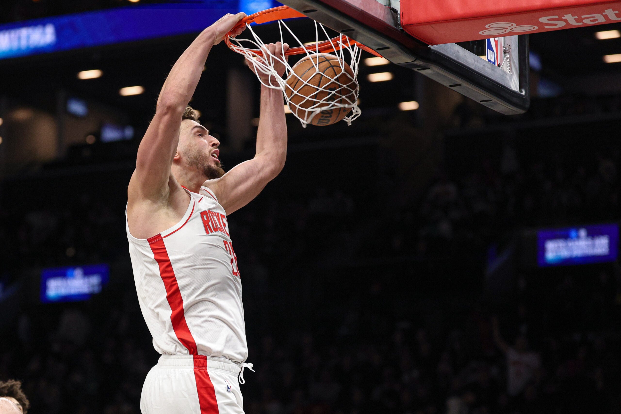 Jan 1, 2026; Brooklyn, New York, USA; Houston Rockets center Alperen Sengun (28) dunks the ball during the second half against the Brooklyn Nets at Barclays Center. Mandatory Credit: Vincent Carchietta-Imagn Images