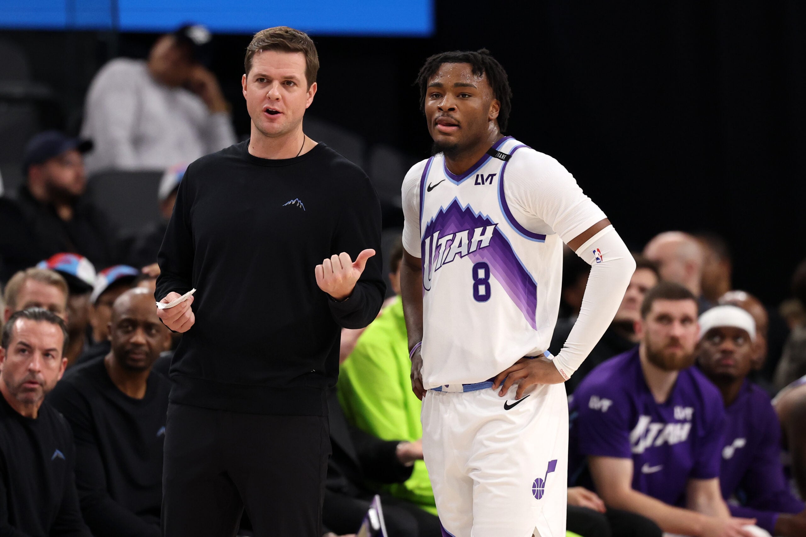 Jan 1, 2026; Inglewood, California, USA;  Utah Jazz Head Coach Will Hardy (left) talks with guard Isaiah Collier (8) during the first half against the Los Angeles Clippers at Intuit Dome. Mandatory Credit: Kiyoshi Mio-Imagn Images