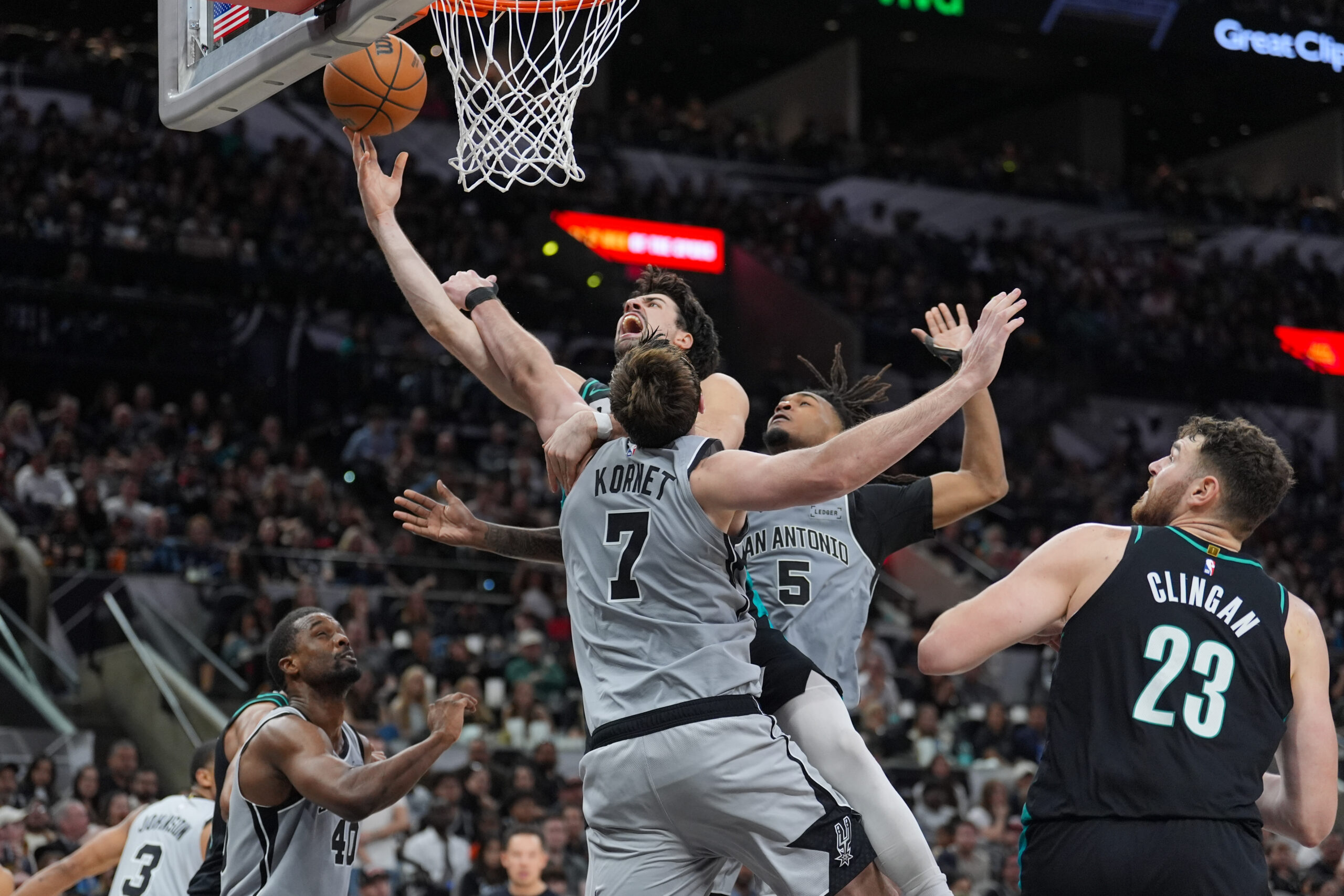 Jan 3, 2026; San Antonio, Texas, USA; Portland Trail Blazers forward Deni Avdija (8) shoots against San Antonio Spurs center/forward Luke Kornet (7) in the second half at Frost Bank Center. Mandatory Credit: Daniel Dunn-Imagn Images