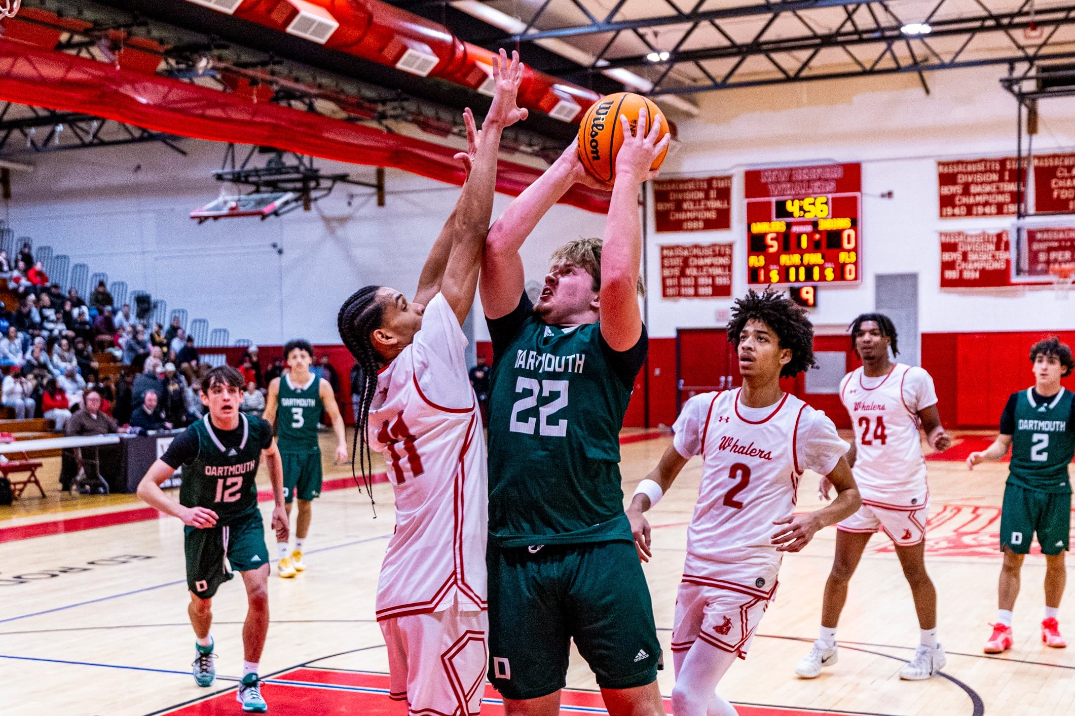 Dartmouth’s Aidan Gendron goes up hard for the layup as New Bedford more then double up Dartmouth 89-44 at home on Monday, January 5th.