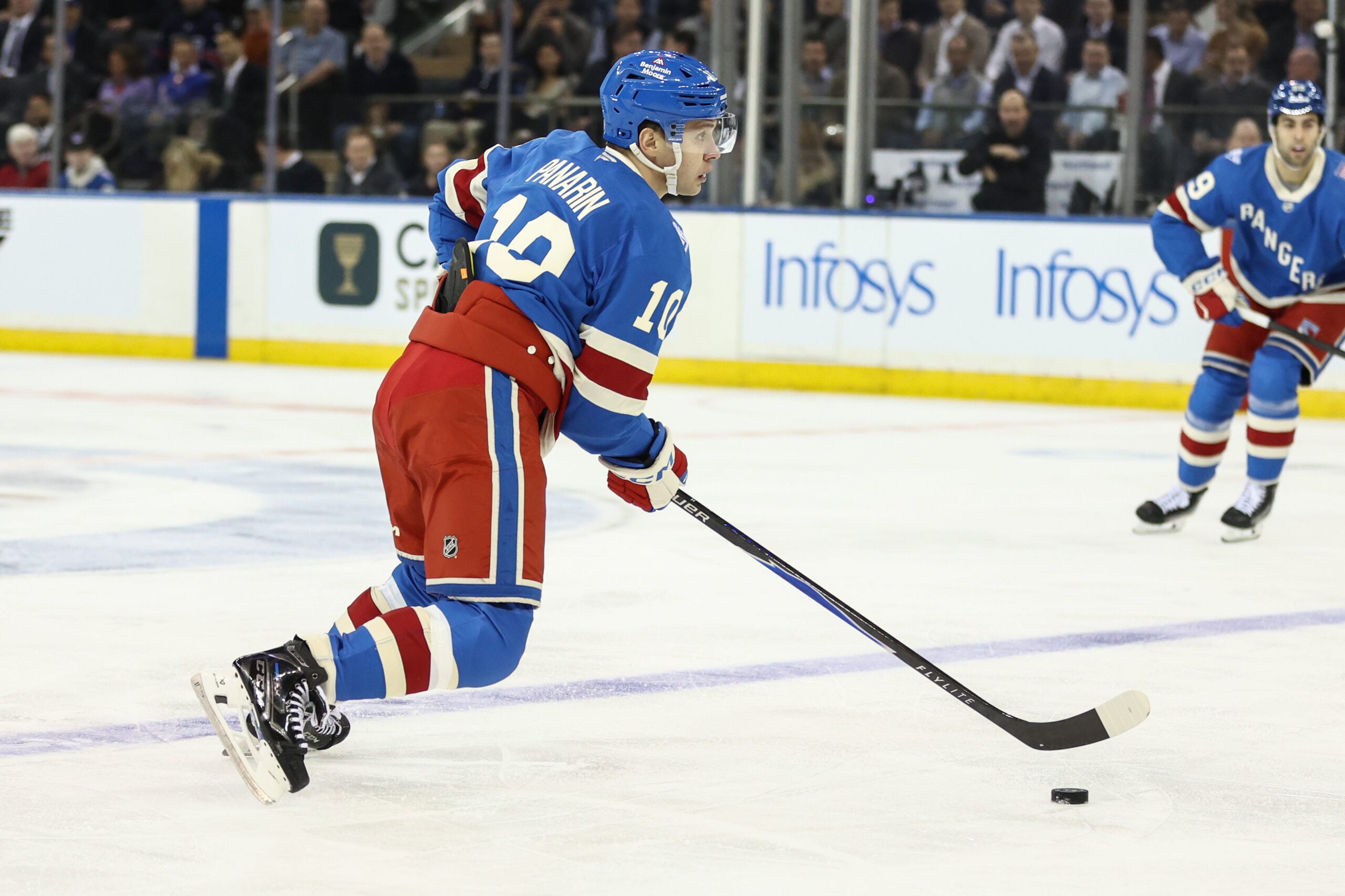 Jan 8, 2026; New York, New York, USA;  New York Rangers left wing Artemi Panarin (10) controls the puck in the first period against the Buffalo Sabres at Madison Square Garden. Mandatory Credit: Wendell Cruz-Imagn Images