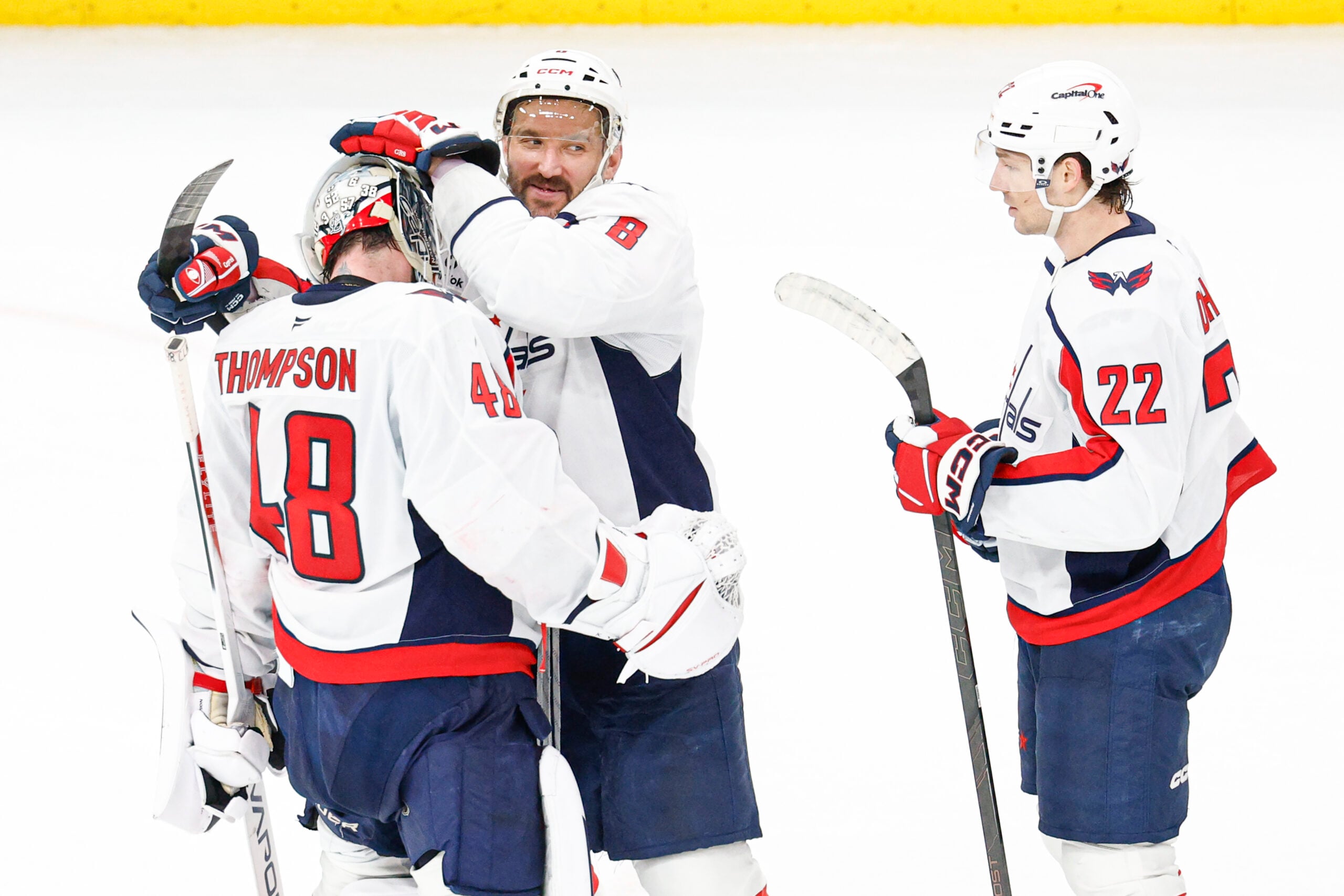 Jan 9, 2026; Chicago, Illinois, USA; Washington Capitals left wing Alex Ovechkin (8) celebrates with goaltender Logan Thompson (48) after defeating the Chicago Blackhawks at United Center. Mandatory Credit: Kamil Krzaczynski-Imagn Images
