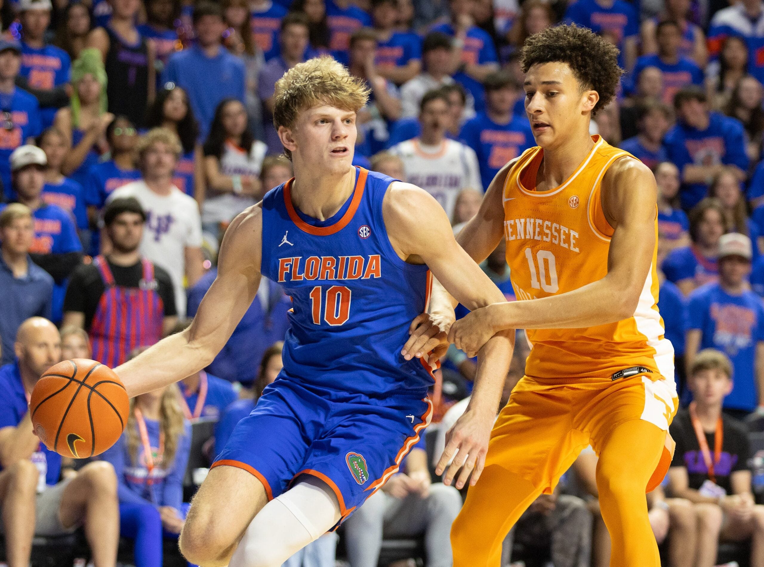 Florida forward Thomas Haugh (10) drives on Tennessee forward Nate Ament (10) during first half of an NCAA basketball at Steven C. O'Connell Center Exactek arena in Gainesville, FL on Saturday, January 10, 2026. [Alan Youngblood/Gainesville Sun]