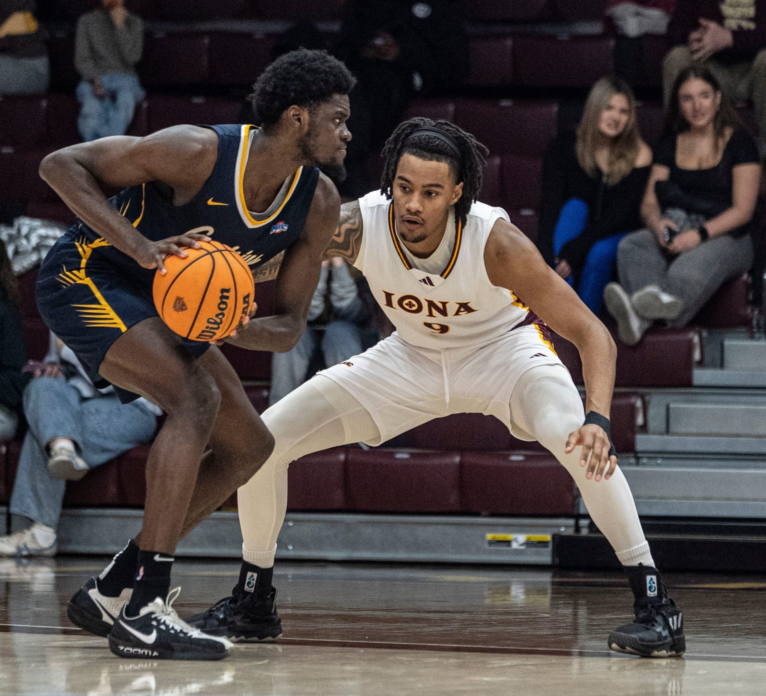 Iona's Lamin Sabally defends against Bryan Ndjonga of Canisius during a MAAC conference basketball game at Iona University in New Rochelle Jan. 11, 2026. Iona defeated Canisius 74-58.