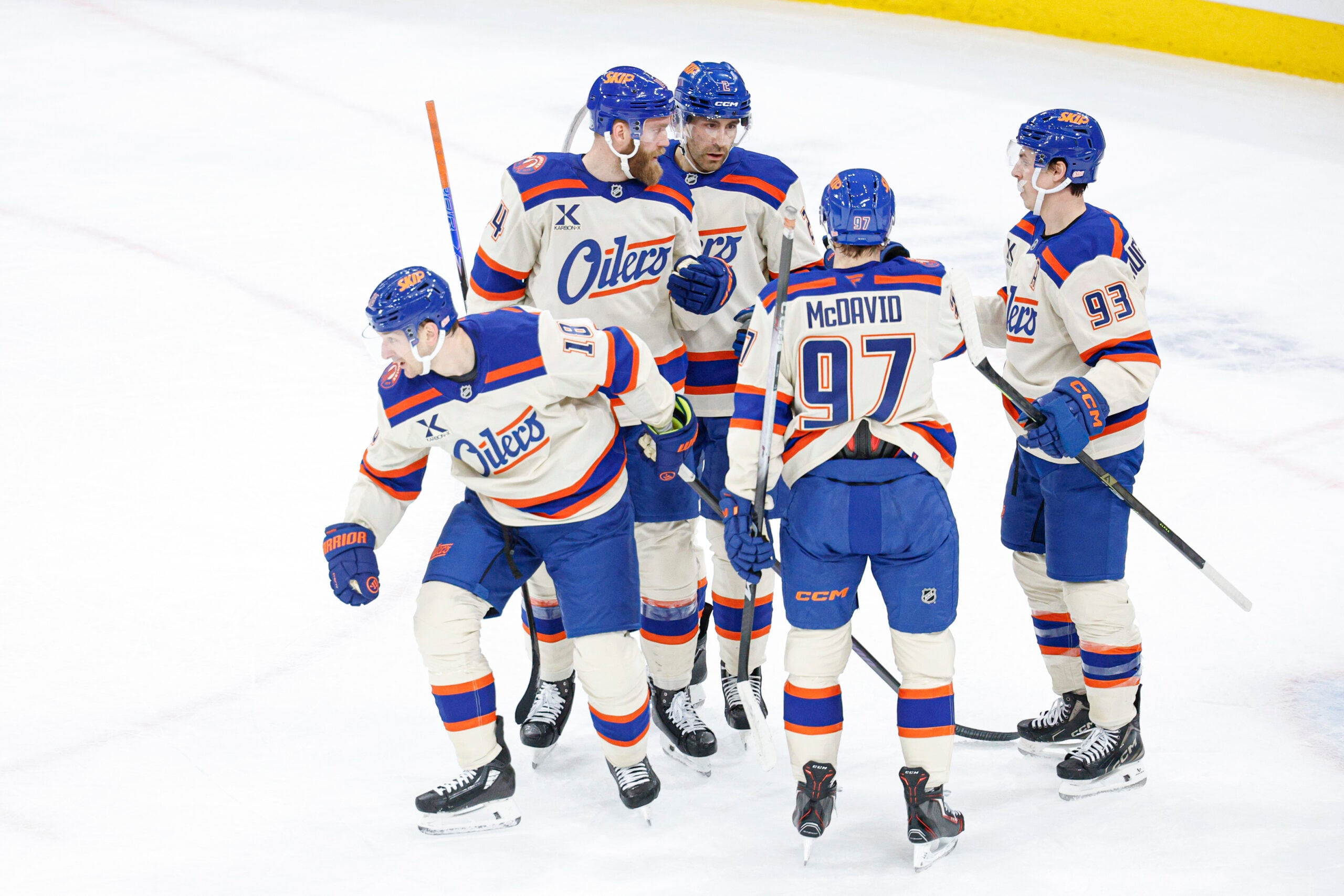 Jan 12, 2026; Chicago, Illinois, USA; Edmonton Oilers left wing Zach Hyman (18) celebrates with teammates after scoring against the Chicago Blackhawks during the first period at United Center. Mandatory Credit: Kamil Krzaczynski-Imagn Images