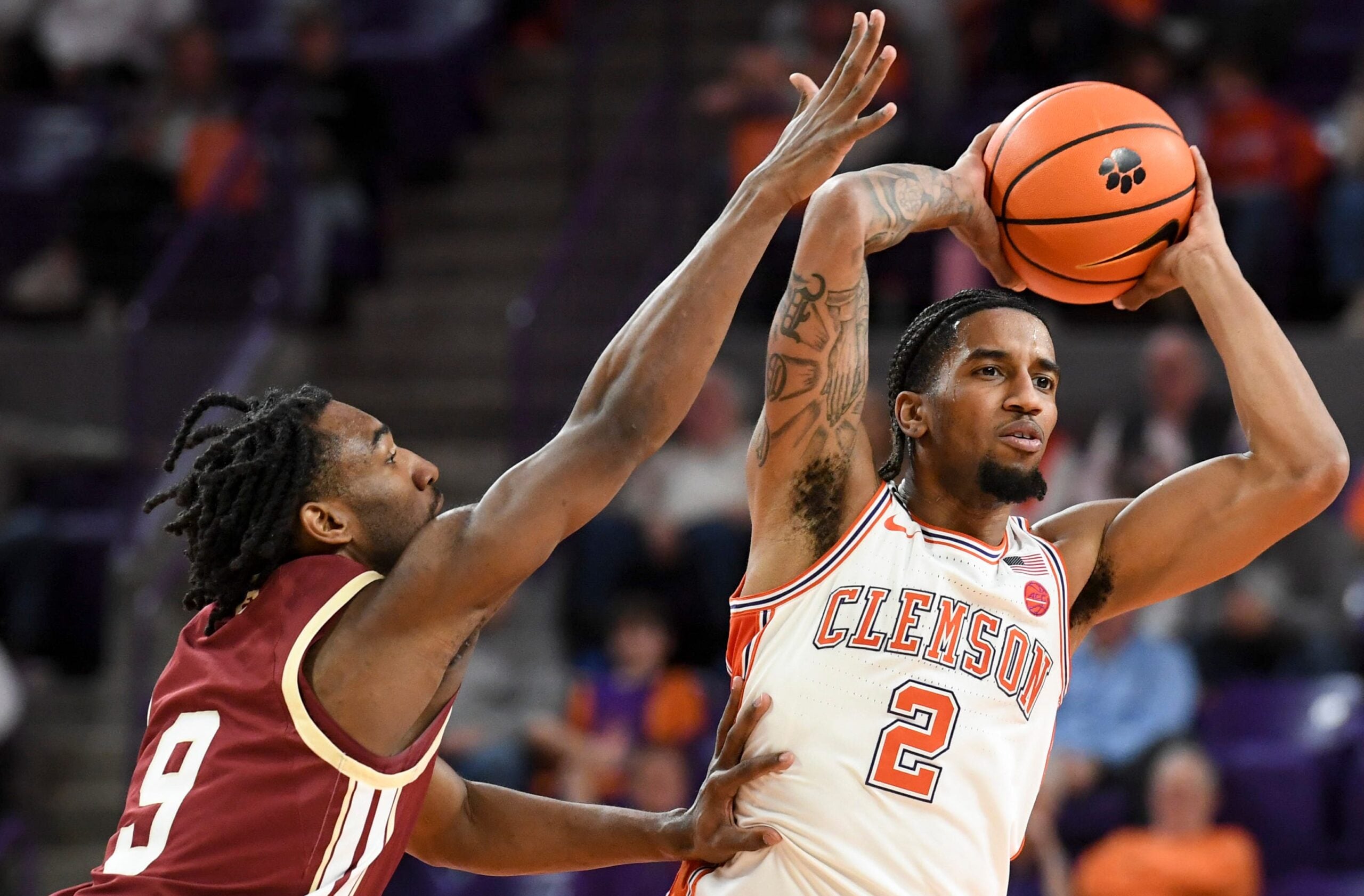 Boston College Eagles guard Chase Forte (9) defends Clemson Tigers guard Dillon Hunter (2) Tuesday, Jan. 13, 2026, during the NCAA men’s basketball game at Littlejohn Coliseum in Clemson, South Carolina.