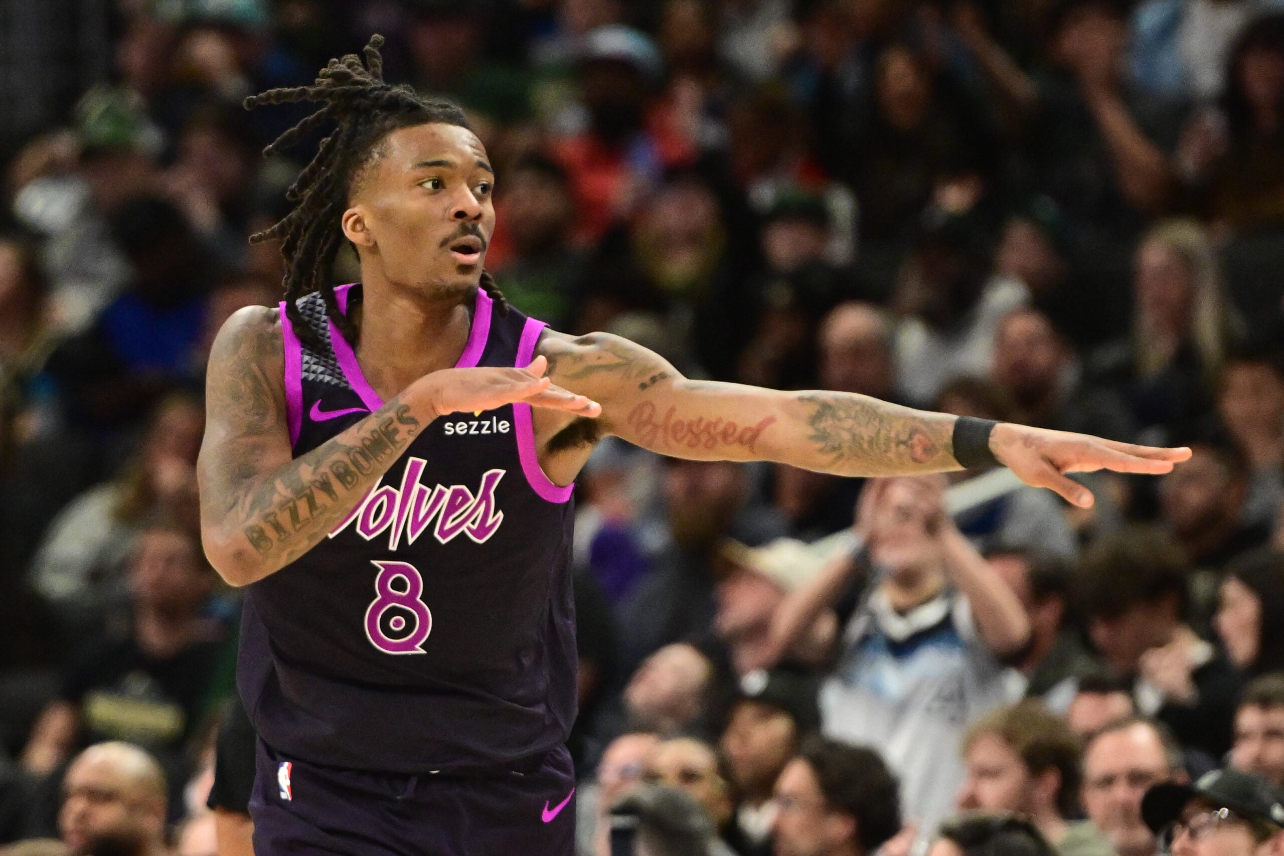 Jan 13, 2026; Milwaukee, Wisconsin, USA; Minnesota Timberwolves guard Bones Hyland (8) reacts after scoring a 3-point basket in the third quarter against the Milwaukee Bucks at Fiserv Forum. Mandatory Credit: Benny Sieu-Imagn Images
