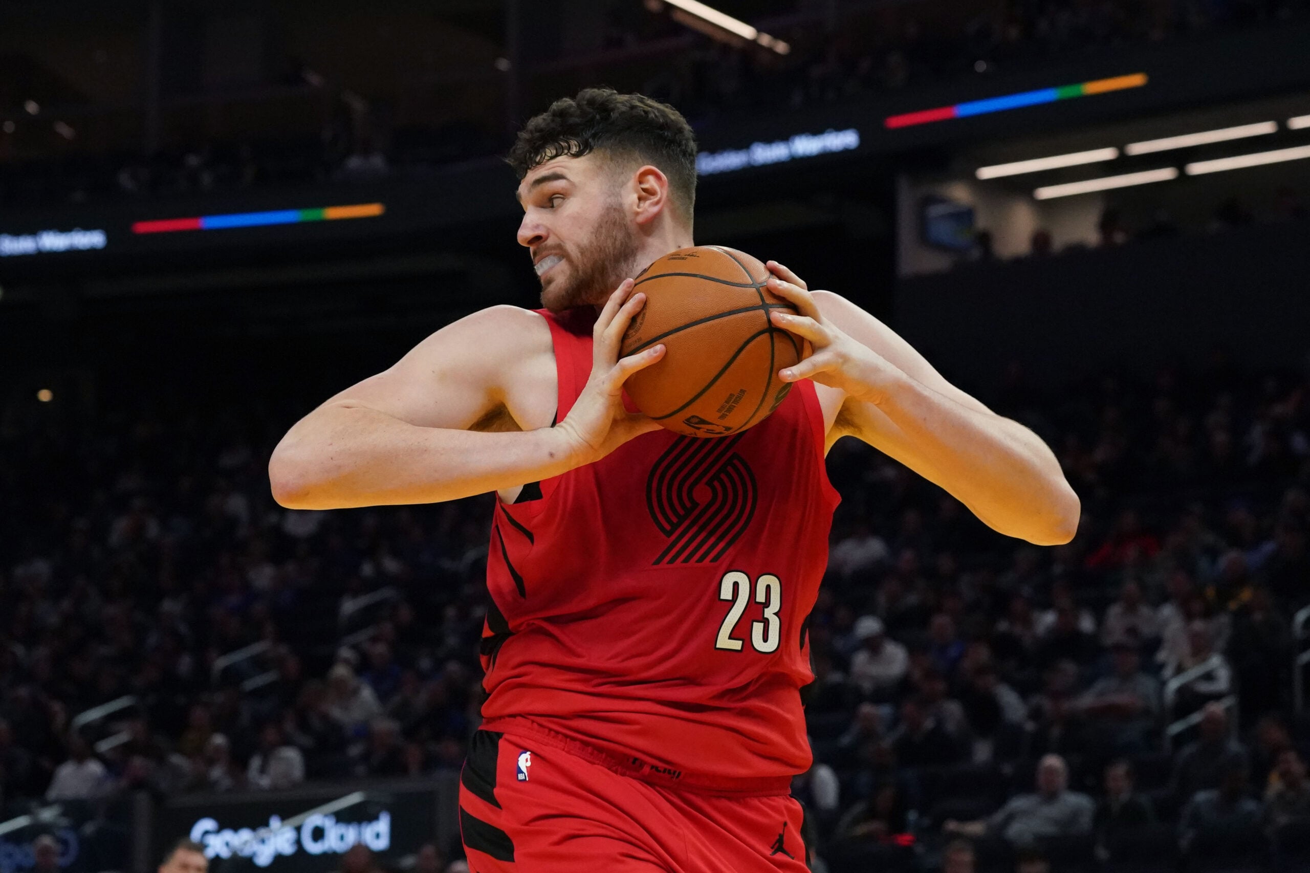 Jan 13, 2026; San Francisco, California, USA;  Portland Trail Blazers center Donovan Clingan (23) grabs a rebound against the Golden State Warriors in the third quarter at Chase Center. Mandatory Credit: David Gonzales-Imagn Images