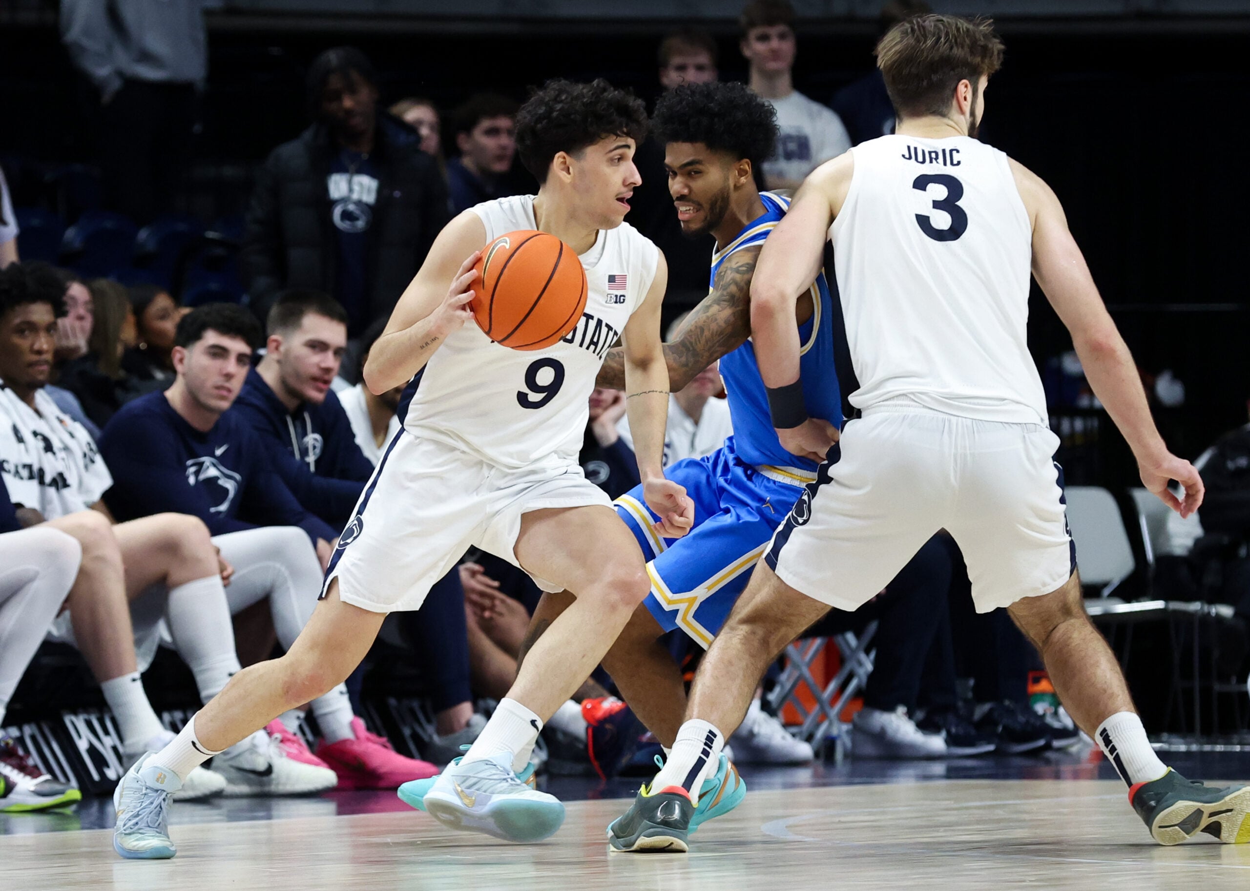 Jan 14, 2026; University Park, Pennsylvania, USA; Penn State Nittany Lions guard Melih Tunca (9) dribbles the ball towards the basket during the second half against the UCLA Bruins at Bryce Jordan Center. Mandatory Credit: Matthew O'Haren-Imagn Images