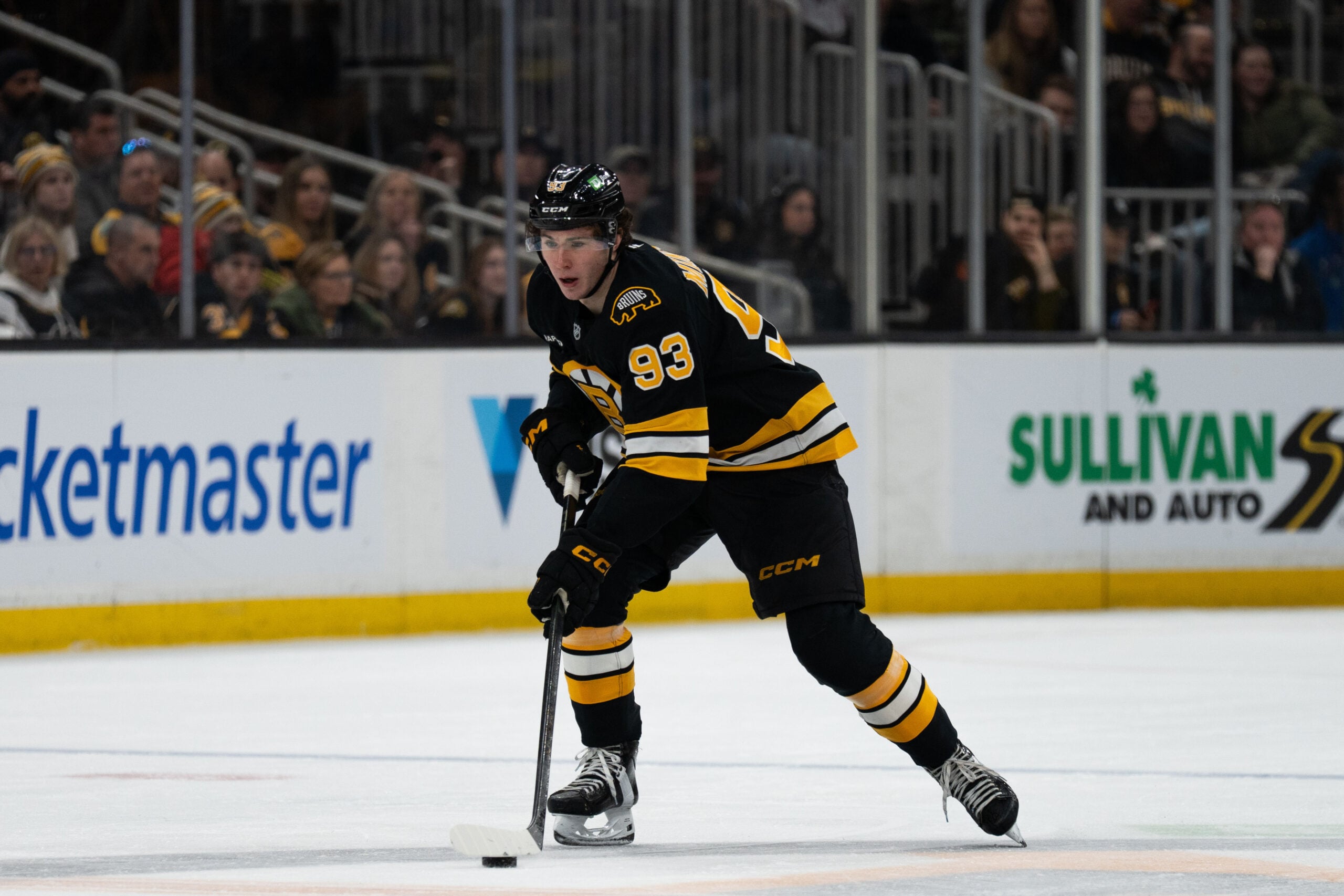 Jan 11, 2026; Boston, Massachusetts, USA; Boston Bruins center Fraser Minten (93) skates with the puck during the third period of the game against the Pittsburgh Penguins at TD Garden. Mandatory Credit: Natalie Reid-Imagn Images