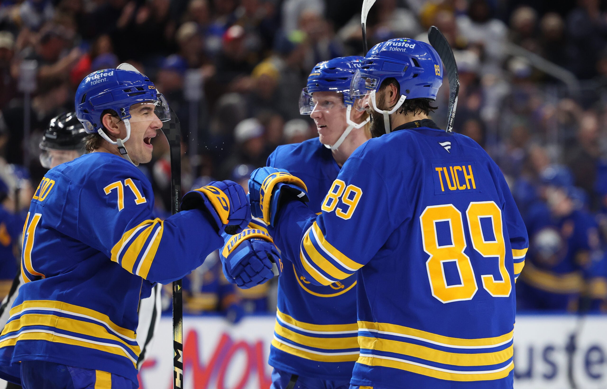 Jan 17, 2026; Buffalo, New York, USA;  Buffalo Sabres right wing Alex Tuch (89) celebrates his goal with teammates during the second period against the Minnesota Wild at KeyBank Center. Mandatory Credit: Timothy T. Ludwig-Imagn Images