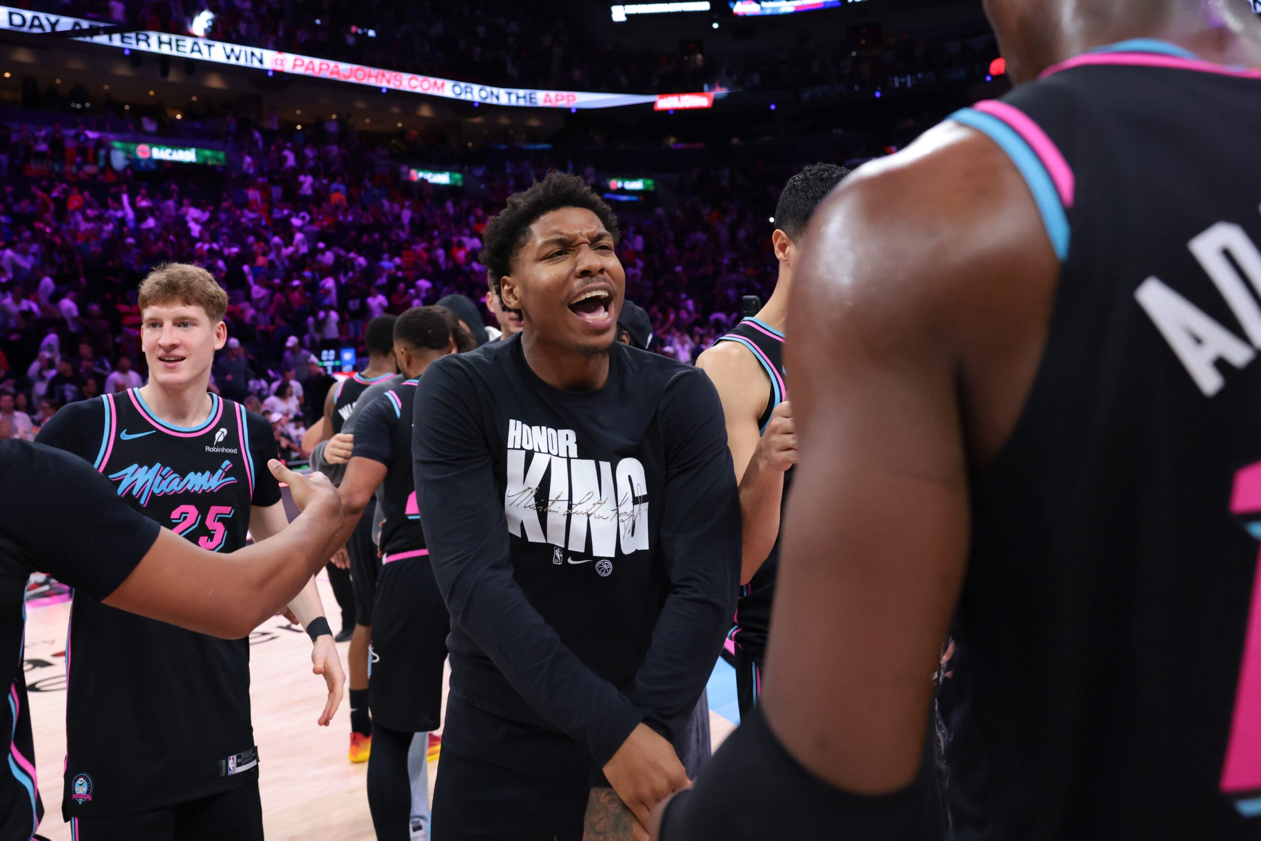 Jan 17, 2026; Miami, Florida, USA; Miami Heat forward Myron Gardner (15) celebrates with center Bam Adebayo (13) after the game against the Oklahoma City Thunder at Kaseya Center. Mandatory Credit: Sam Navarro-Imagn Images