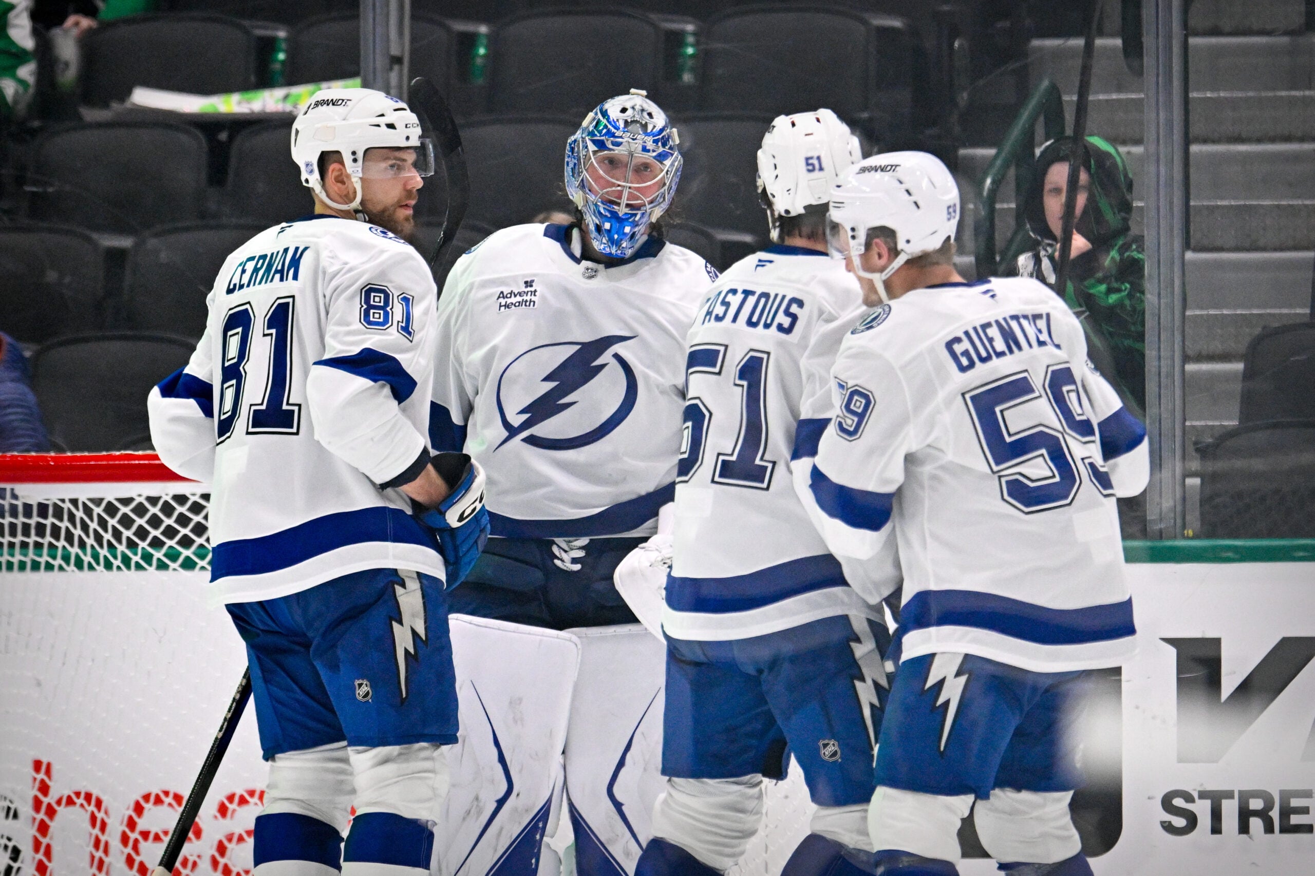 Jan 18, 2026; Dallas, Texas, USA; Tampa Bay Lightning defenseman Erik Cernak (81) and goaltender Andrei Vasilevskiy (88) and defenseman Charle-Edouard D'Astous (51) and center Jake Guentzel (59) celebrate the win over the Dallas Stars at the American Airlines Center. Mandatory Credit: Jerome Miron-Imagn Images