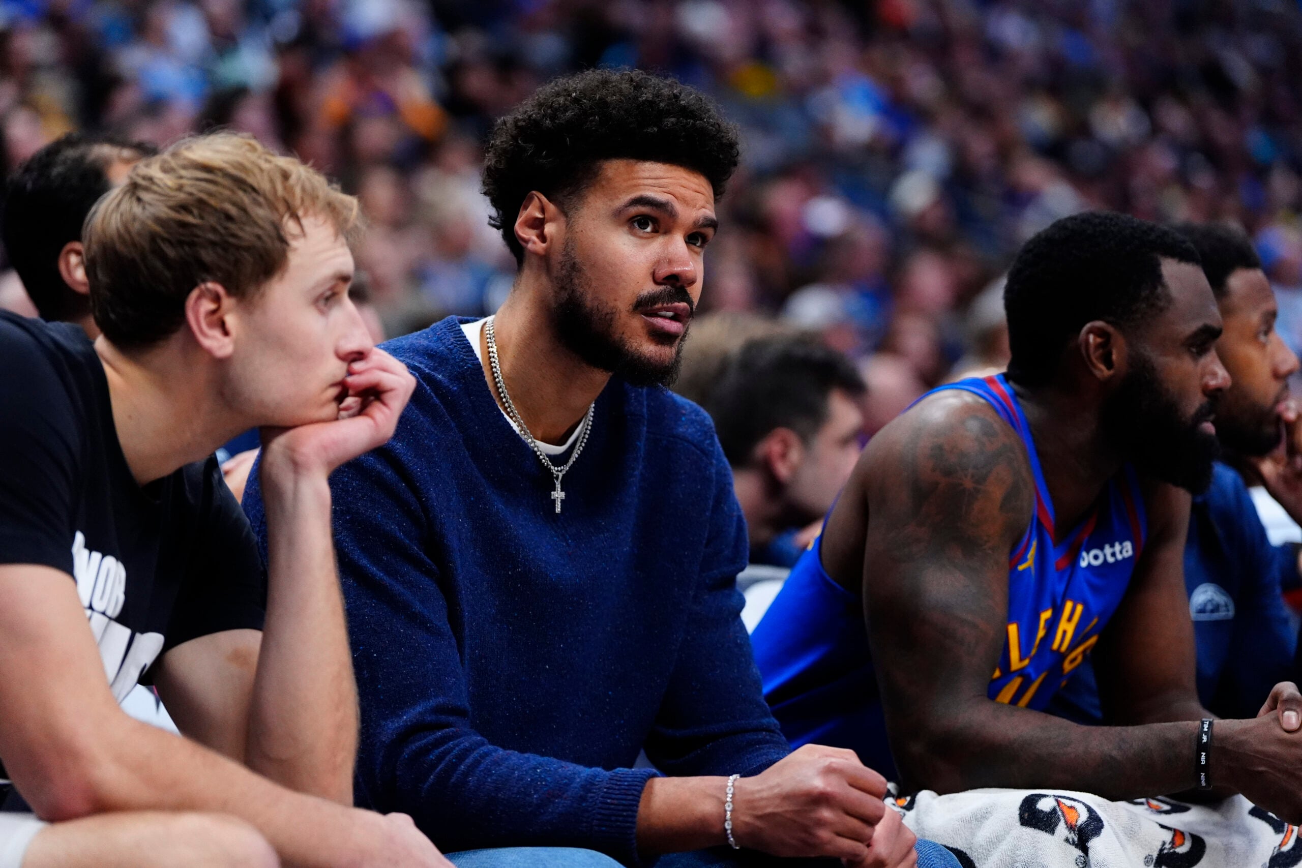 Jan 18, 2026; Denver, Colorado, USA; Denver Nuggets forward Cameron Johnson (23) on the bench in the second quarter against the Charlotte Hornets at Ball Arena. Mandatory Credit: Ron Chenoy-Imagn Images