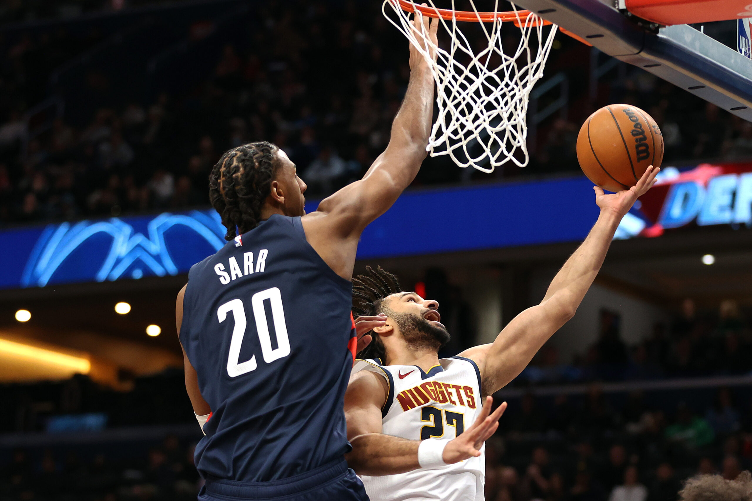 Jan 22, 2026; Washington, District of Columbia, USA; Denver Nuggets guard Jamal Murray (27) shoots over Washington Wizards center Alex Sarr (20) during the second half at Capital One Arena. Mandatory Credit: Daniel Kucin Jr.-Imagn Images