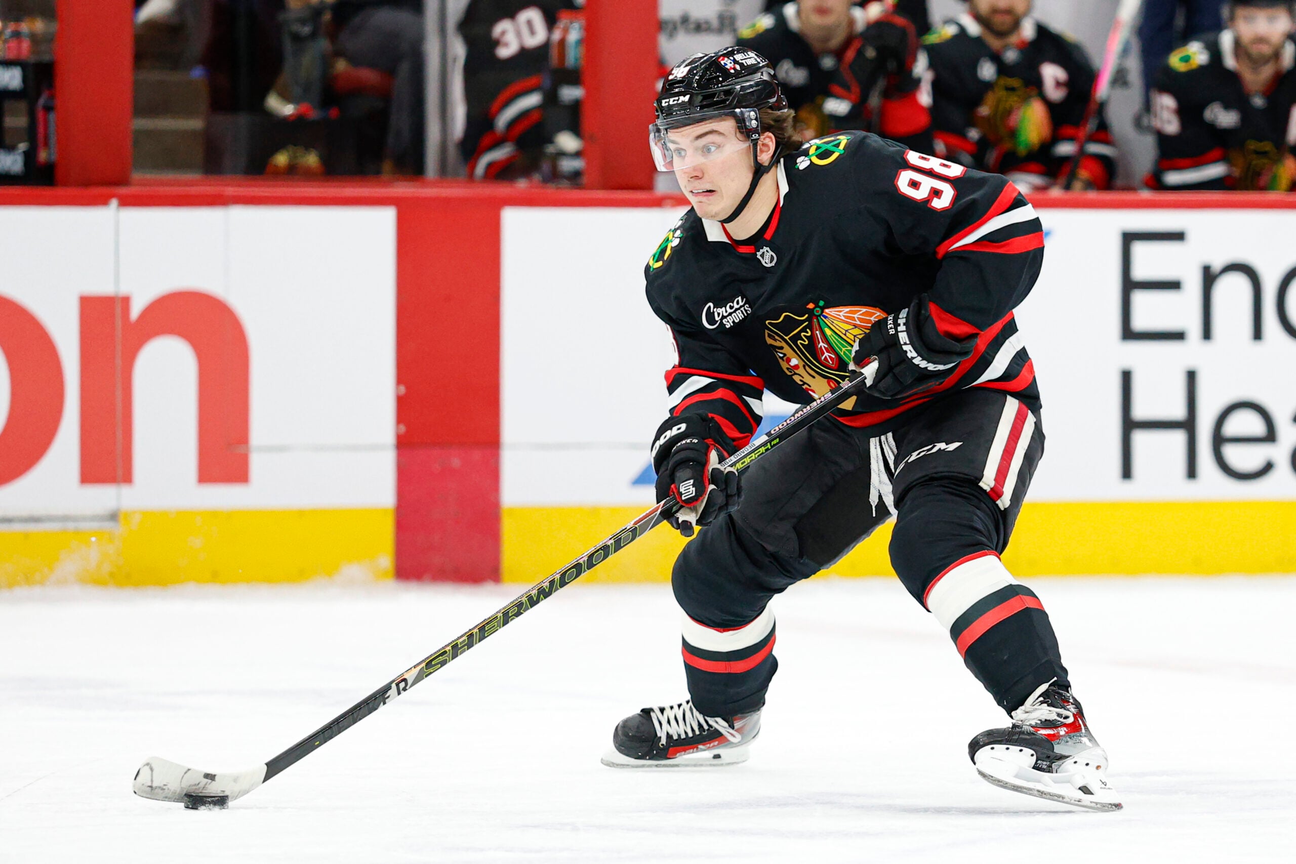 Jan 23, 2026; Chicago, Illinois, USA; Chicago Blackhawks center Connor Bedard (98) looks to pass the puck against the Tampa Bay Lightning during the first period at United Center. Mandatory Credit: Kamil Krzaczynski-Imagn Images