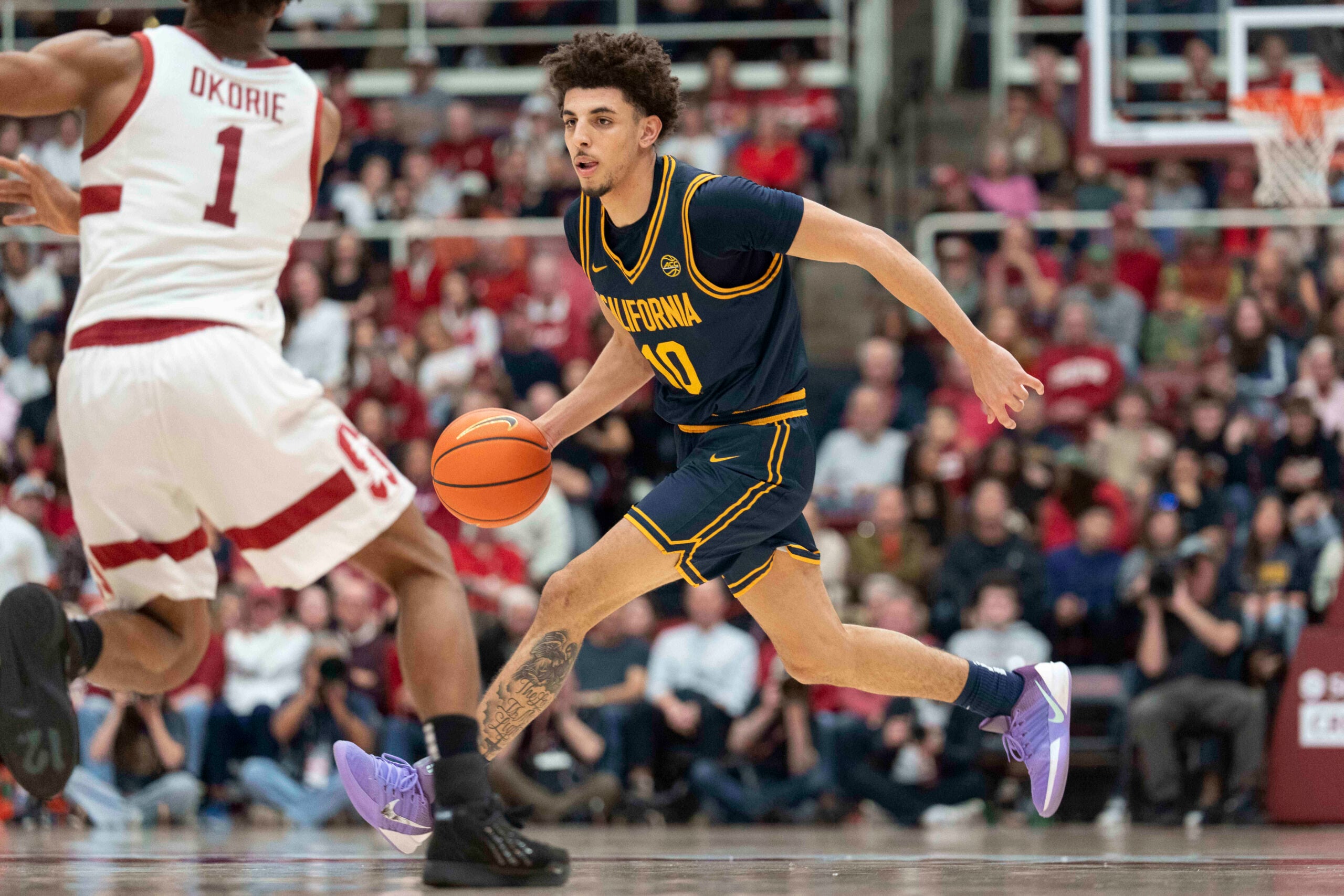 Jan 24, 2026; Stanford, California, USA;  California Golden Bears guard Justin Pippen (10) drives the ball during the second half against the Stanford Cardinal at Maples Pavilion. Mandatory Credit: Stan Szeto-Imagn Images