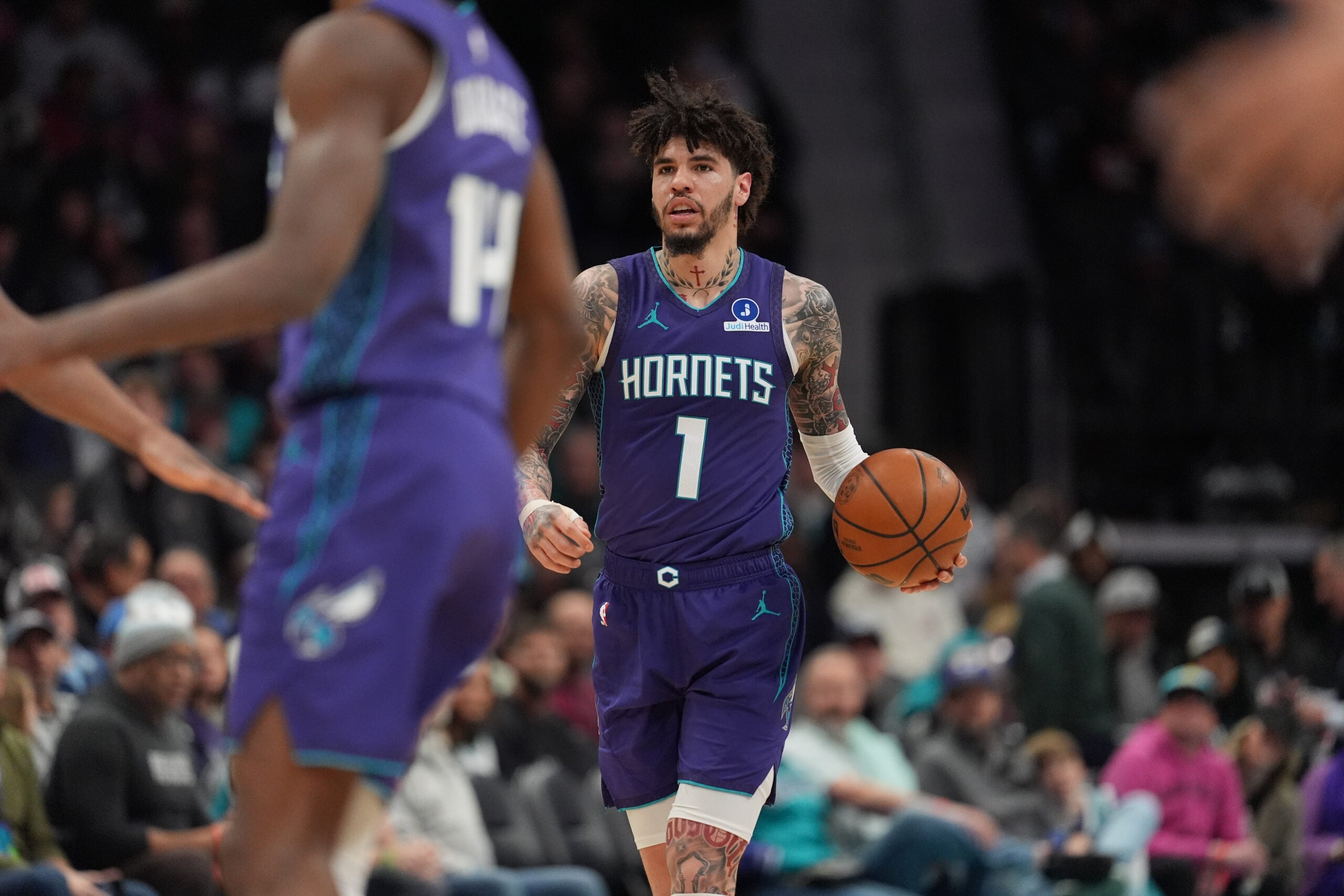 Jan 26, 2026; Charlotte, North Carolina, USA; Charlotte Hornets guard LaMelo Ball (1) brings the ball up court against the Philadelphia 76ers during the second half at Spectrum Center. Mandatory Credit: Jim Dedmon-Imagn Images