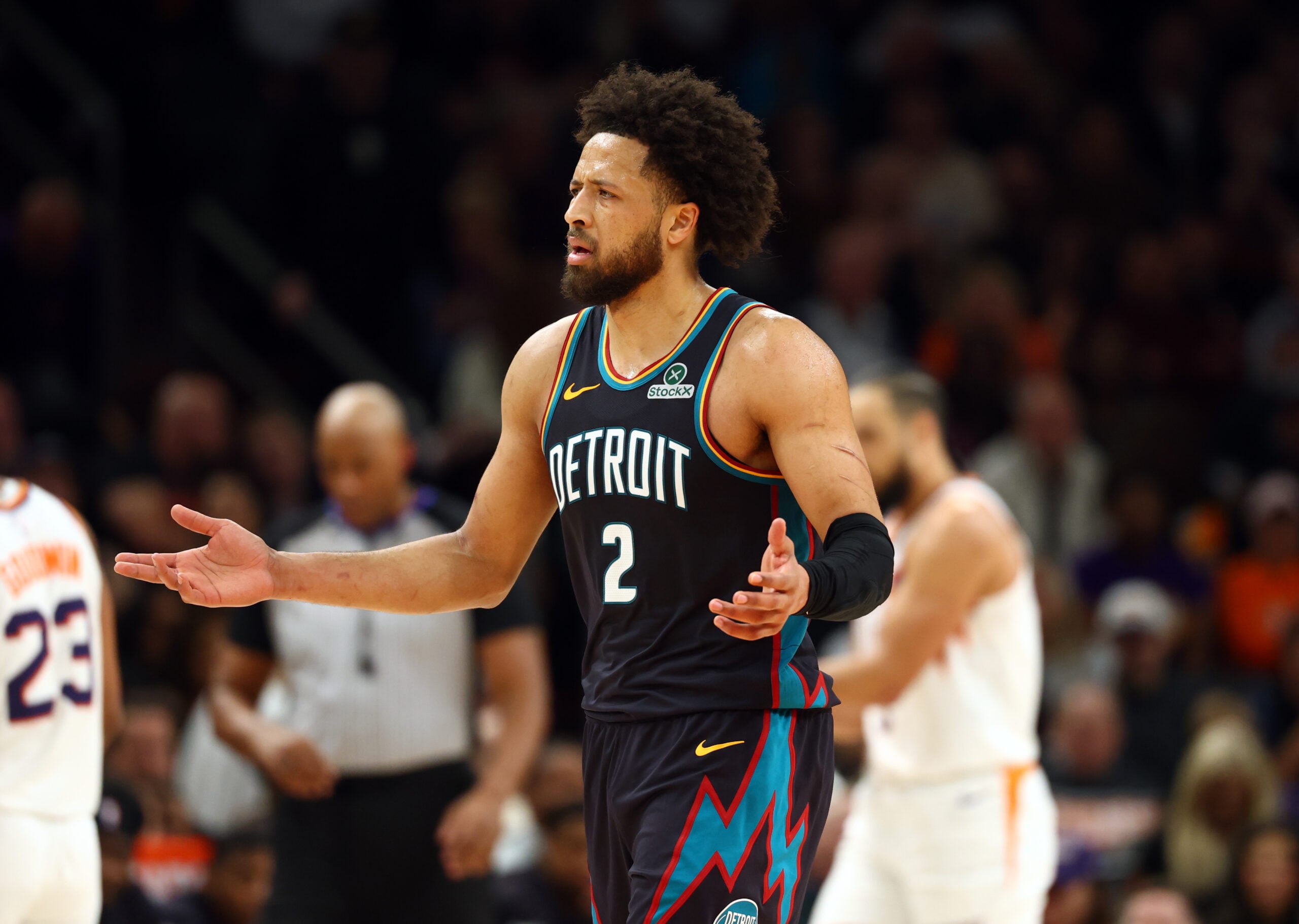 Jan 29, 2026; Phoenix, Arizona, USA; Detroit Pistons guard Cade Cunningham (2) reacts against the Phoenix Suns in the first half at Mortgage Matchup Center. Mandatory Credit: Mark J. Rebilas-Imagn Images