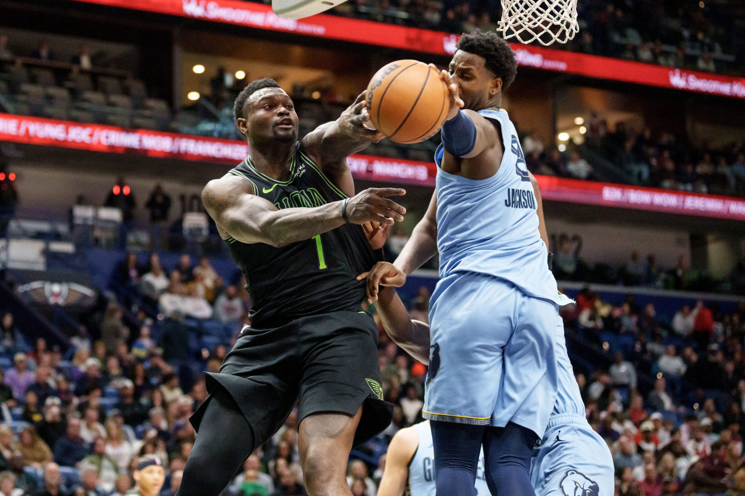 Jan 30, 2026; New Orleans, Louisiana, USA; New Orleans Pelicans forward Zion Williamson (1) has his pass blocked by Memphis Grizzlies forward Jaren Jackson Jr. (8) during the second half at Smoothie King Center. Mandatory Credit: Matthew Hinton-Imagn Images
