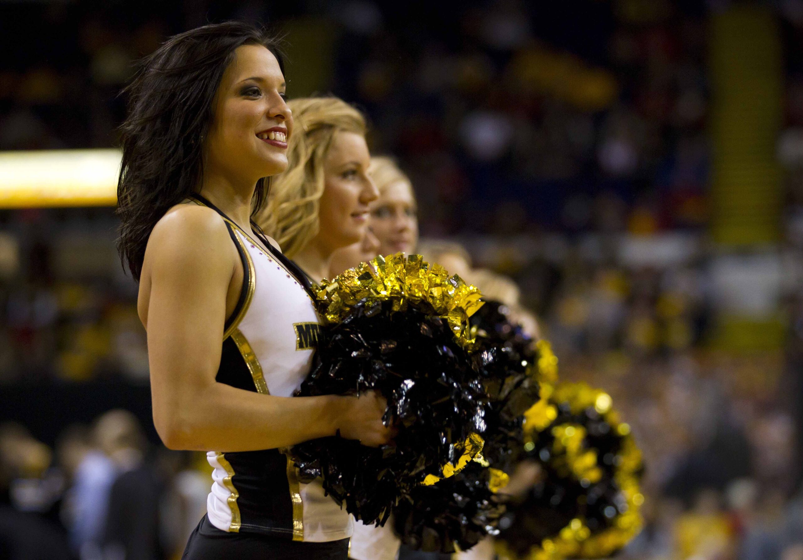 Dec 13, 2011; Milwaukee, WI, USA; Milwaukee Panthers cheerleaders perform during the game against the Wisconsin Badgers at the US Cellular Arena. Wisconsin defeated Milwaukee 60-54. Mandatory Credit: Jeff Hanisch-Imagn Images
