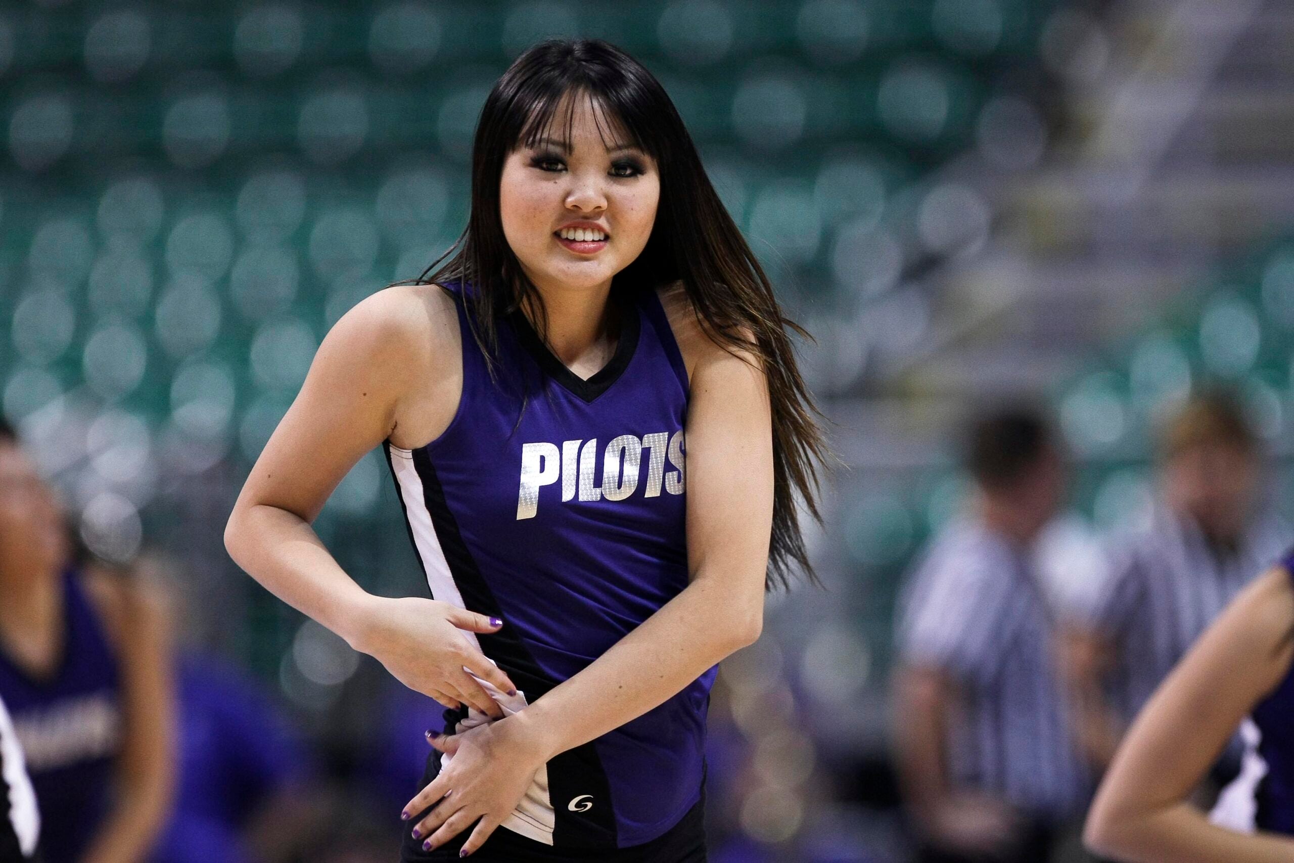 March 02, 2012; Las Vegas, NV, USA; Portland Pilots cheerleader performs during a timeout against the San Diego Toreros during the second half of the quarterfinals of the 2012 West Coast Conference Tournament at Orleans Arena. The San Diego Toreros defeated the Portland Pilots 70-60. Mandatory Credit: Kelley L Cox-Imagn Images