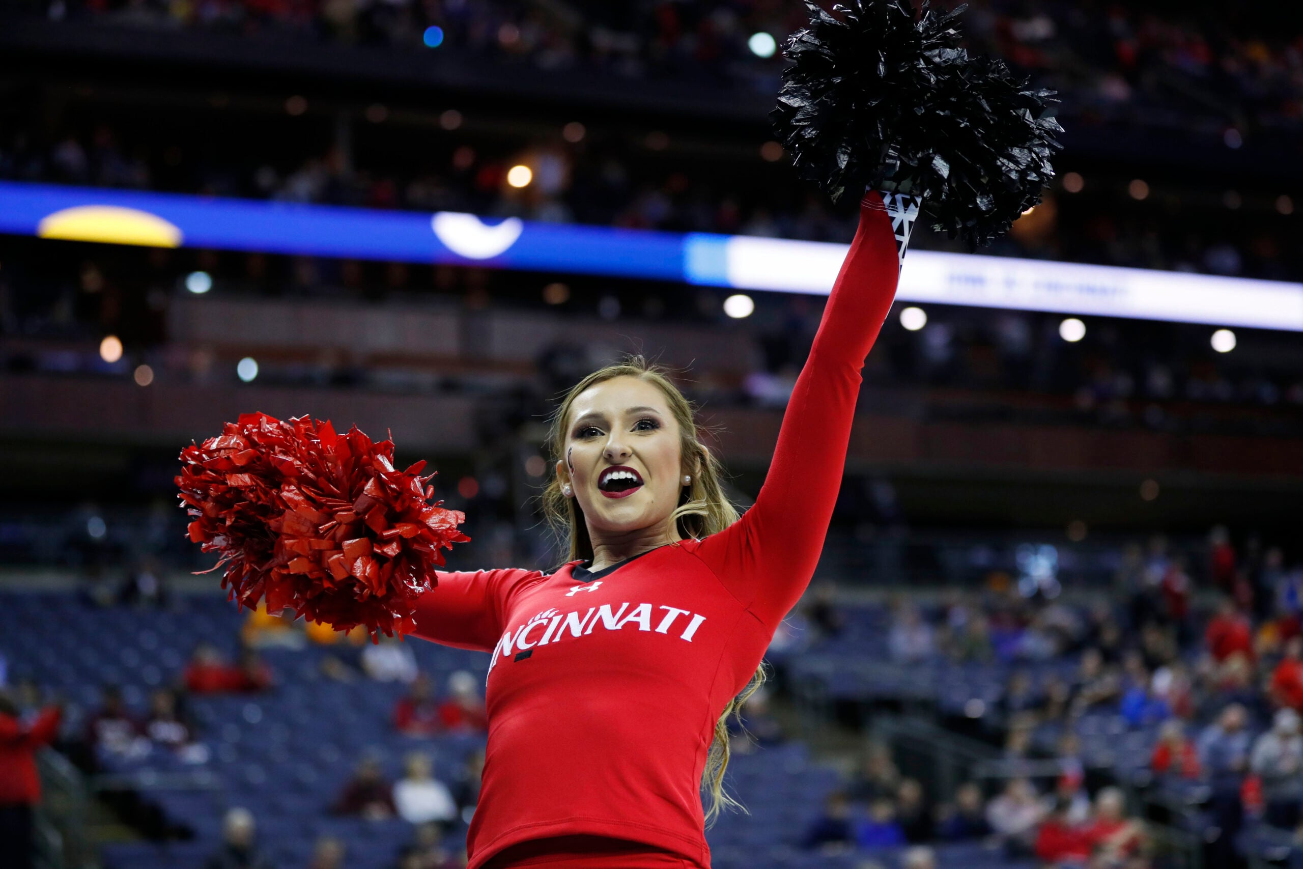 Mar 22, 2019; Columbus, OH, USA; Cincinnati Bearcats cheerleader before the game against the Iowa Hawkeyes in the first round of the 2019 NCAA Tournament at Nationwide Arena. Mandatory Credit: Rick Osentoski-Imagn Images