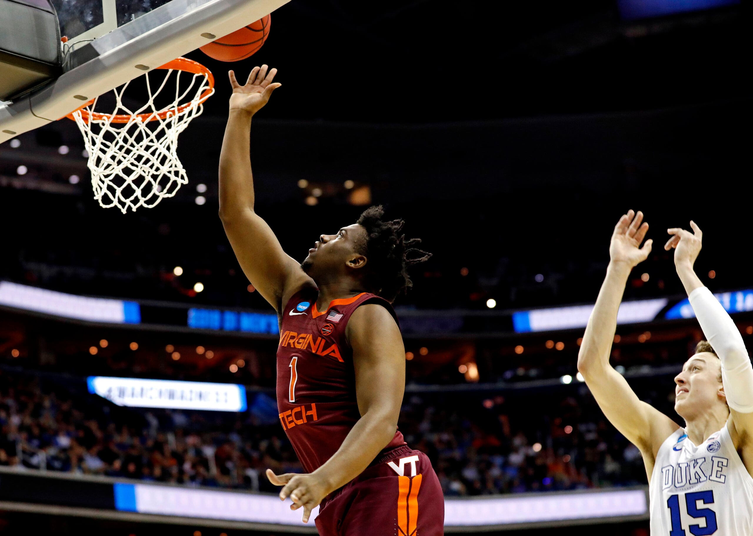 Mar 29, 2019; Washington, DC, USA; Virginia Tech Hokies guard Isaiah Wilkins (1) shoots the ball against Duke Blue Devils guard Alex O'Connell (15) during the second half in the semifinals of the east regional of the 2019 NCAA Tournament at Capital One Arena. Mandatory Credit: Geoff Burke-Imagn Images