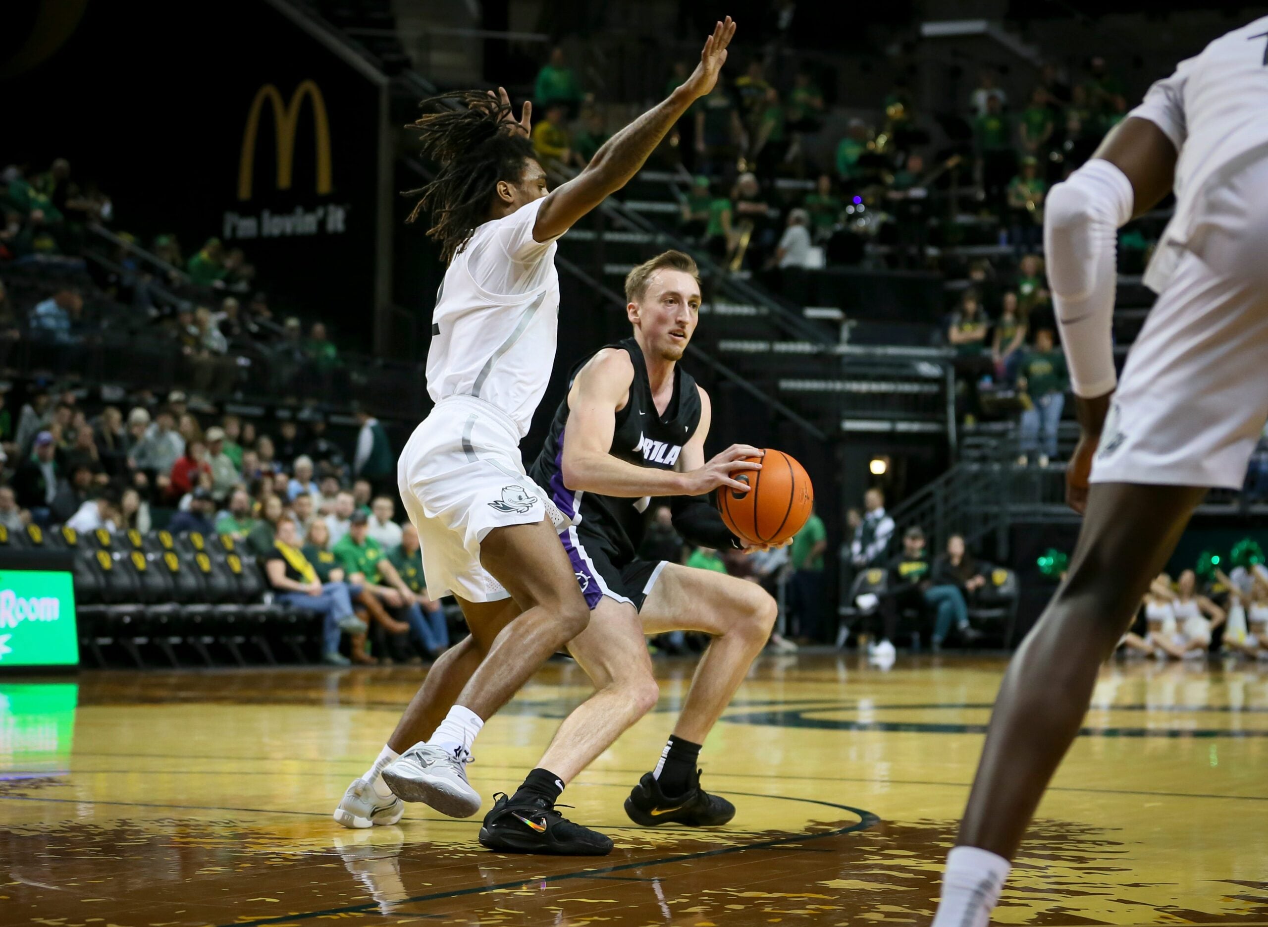 Oregon guard Tyrone Williams blocks as Portland   s Moses Wood drives toward the basket as the Oregon Ducks host the Portland Pilots Saturday, Dec. 17, 2022, at Matthew Knight Arena in Eugene, Ore.

Ncaa Basketball Oregon Ducks Vs Portland Pilots Men S Basketball Portland Pilots At Oregon Ducks