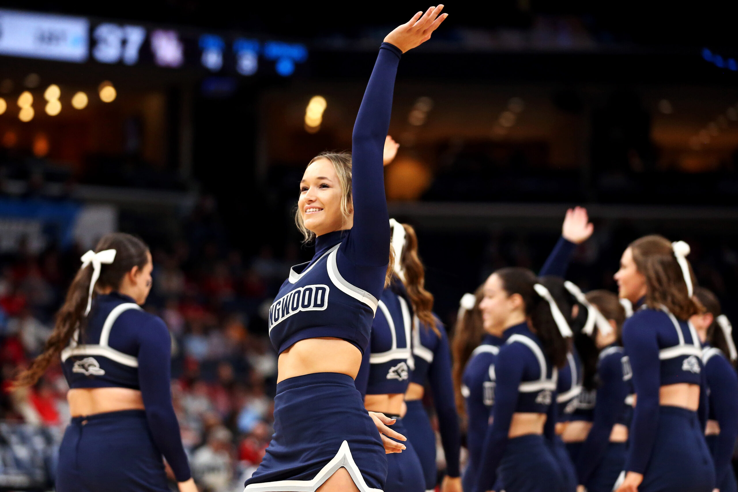 Mar 22, 2024; Memphis, TN, USA;  The Longwood Lancers cheerleaders cheer during a time out of the game between the Houston Cougars and the Longwood Lancers in the first round of the 2024 NCAA Tournament at FedExForum. Mandatory Credit: Petre Thomas-Imagn Images