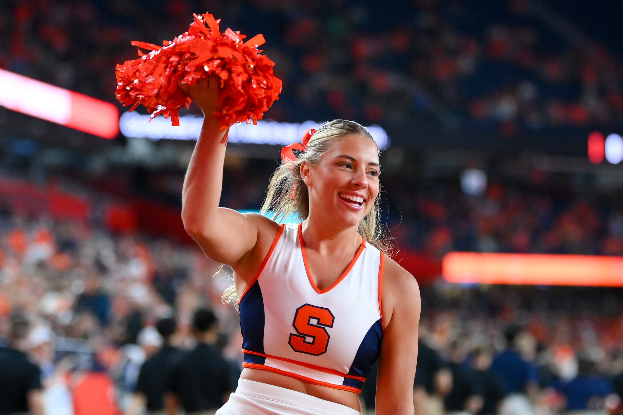 Sep 20, 2024; Syracuse, New York, USA; A Syracuse Orange cheerleader performs prior to a game against the Stanford Cardinal at the JMA Wireless Dome. Mandatory Credit: Rich Barnes-Imagn Images