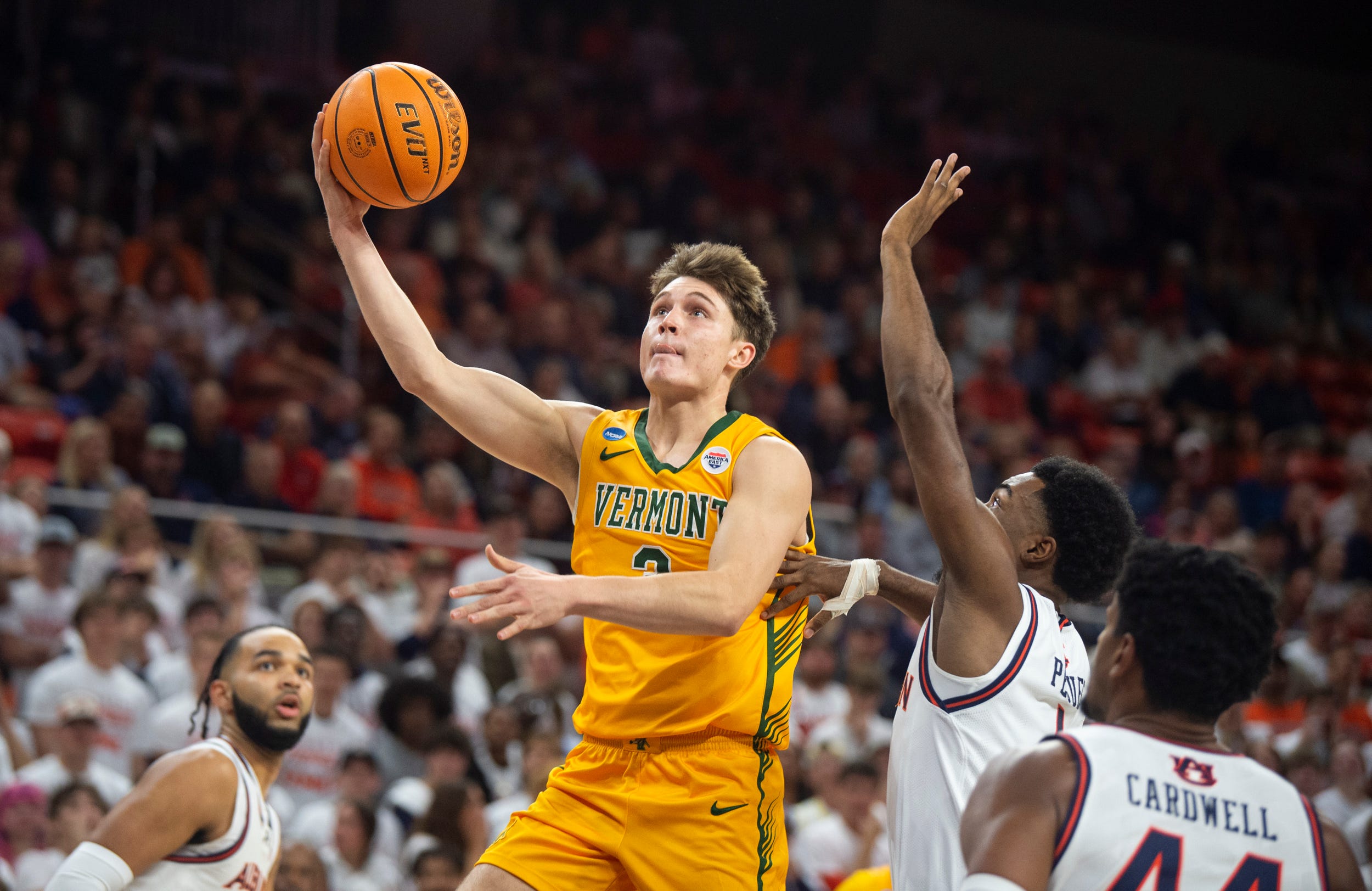 Vermont Catamounts guard TJ Hurley (3) goes up for a layup as Auburn Tigers take on Vermont Catamounts at Neville Arena in Auburn, Ala., on Wednesday, Nov. 6, 2024.