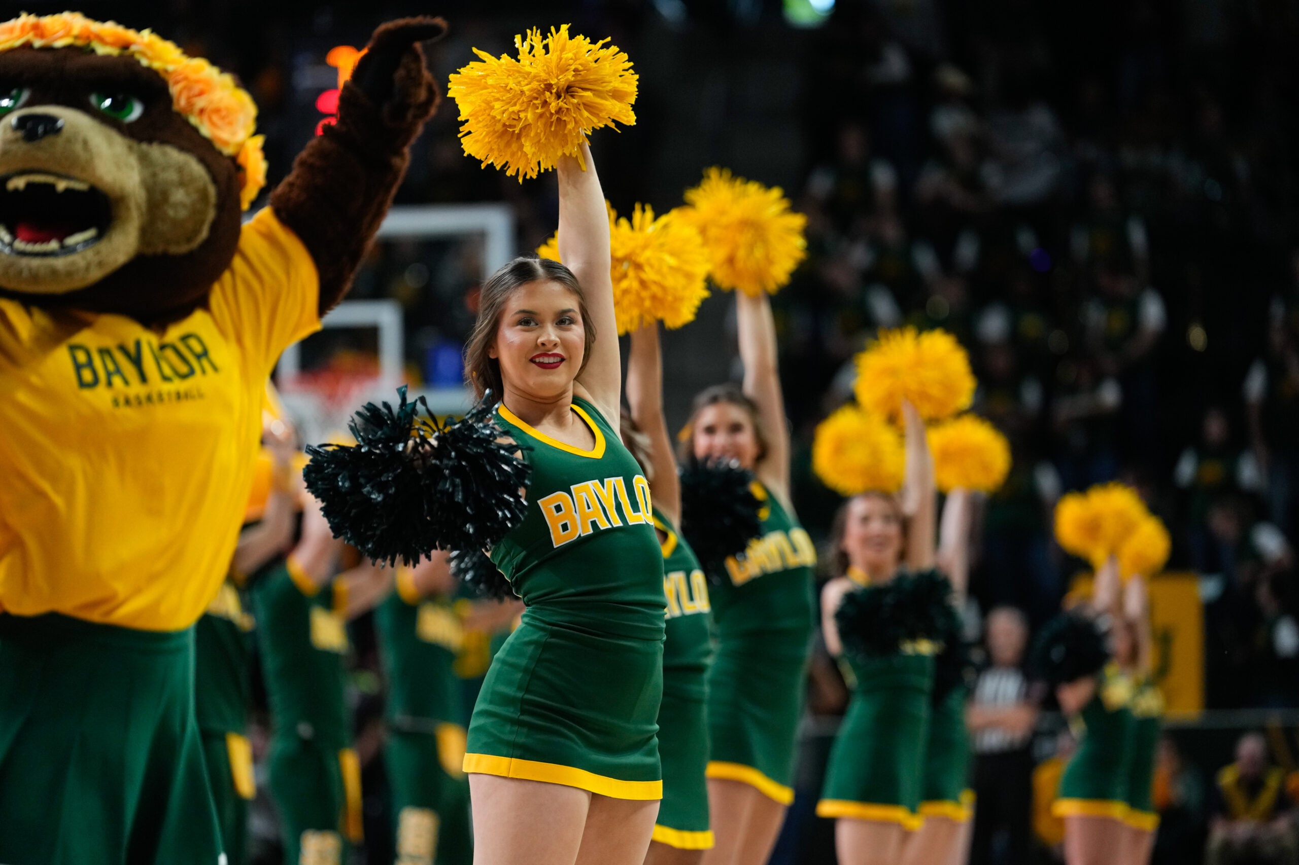 Jan 19, 2025; Waco, Texas, USA; The Baylor Bear Cheerleaders perform during a break in play against the TCU Horned Frogs during the first half at Paul and Alejandra Foster Pavilion. Mandatory Credit: Chris Jones-Imagn Images