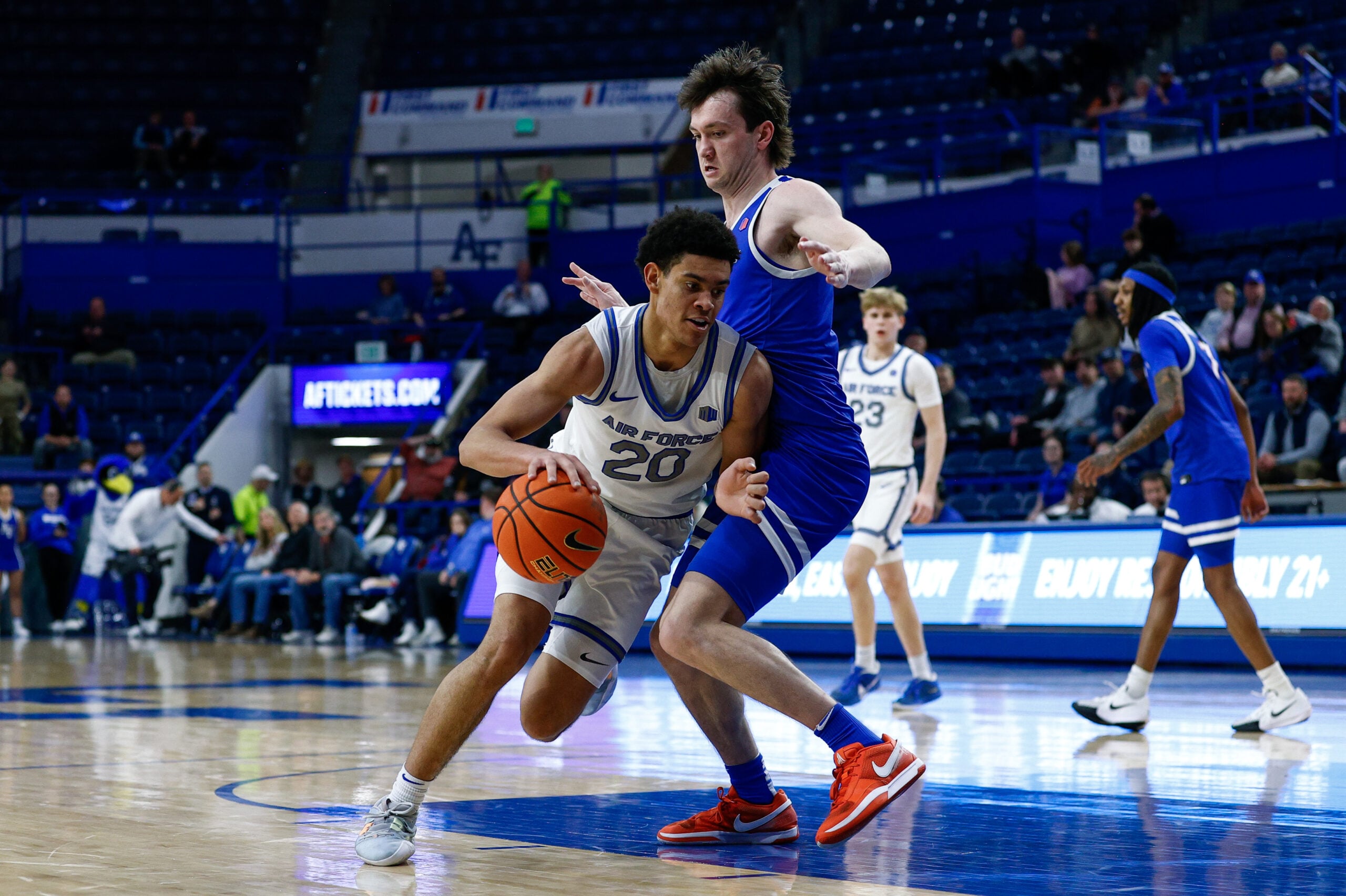 Mar 4, 2025; Colorado Springs, Colorado, USA; Air Force Falcons guard Yoda Oke (20) controls the ball as Boise State Broncos guard RJ Keene II (5) guards in the second half at Clune Arena. Mandatory Credit: Isaiah J. Downing-Imagn Images