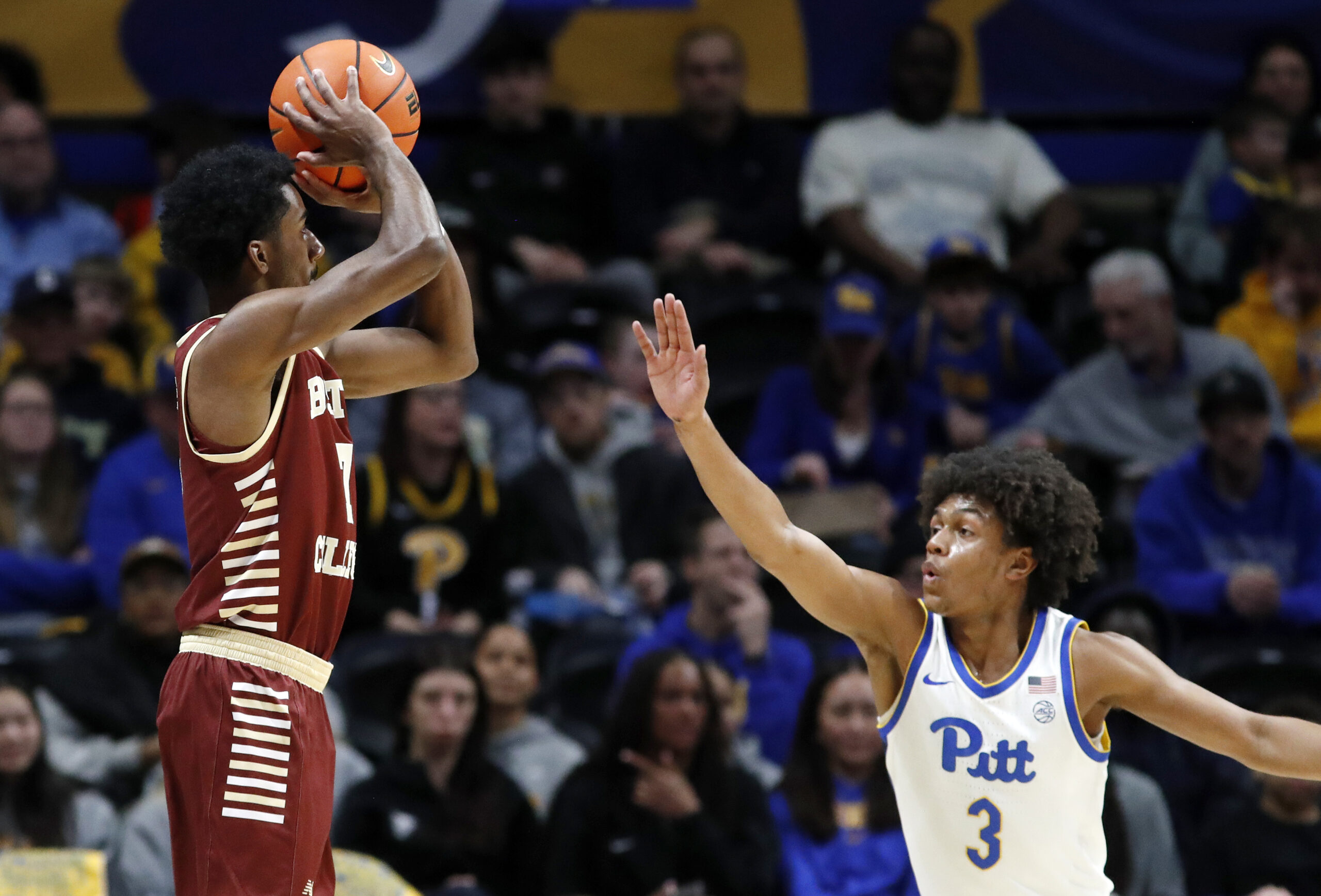Mar 8, 2025; Pittsburgh, Pennsylvania, USA;  Boston College Eagles guard Joshua Beadle (7) shoots against Pittsburgh Panthers guard Brandin Cummings (3) during the first half at the Petersen Events Center. Mandatory Credit: Charles LeClaire-Imagn Images