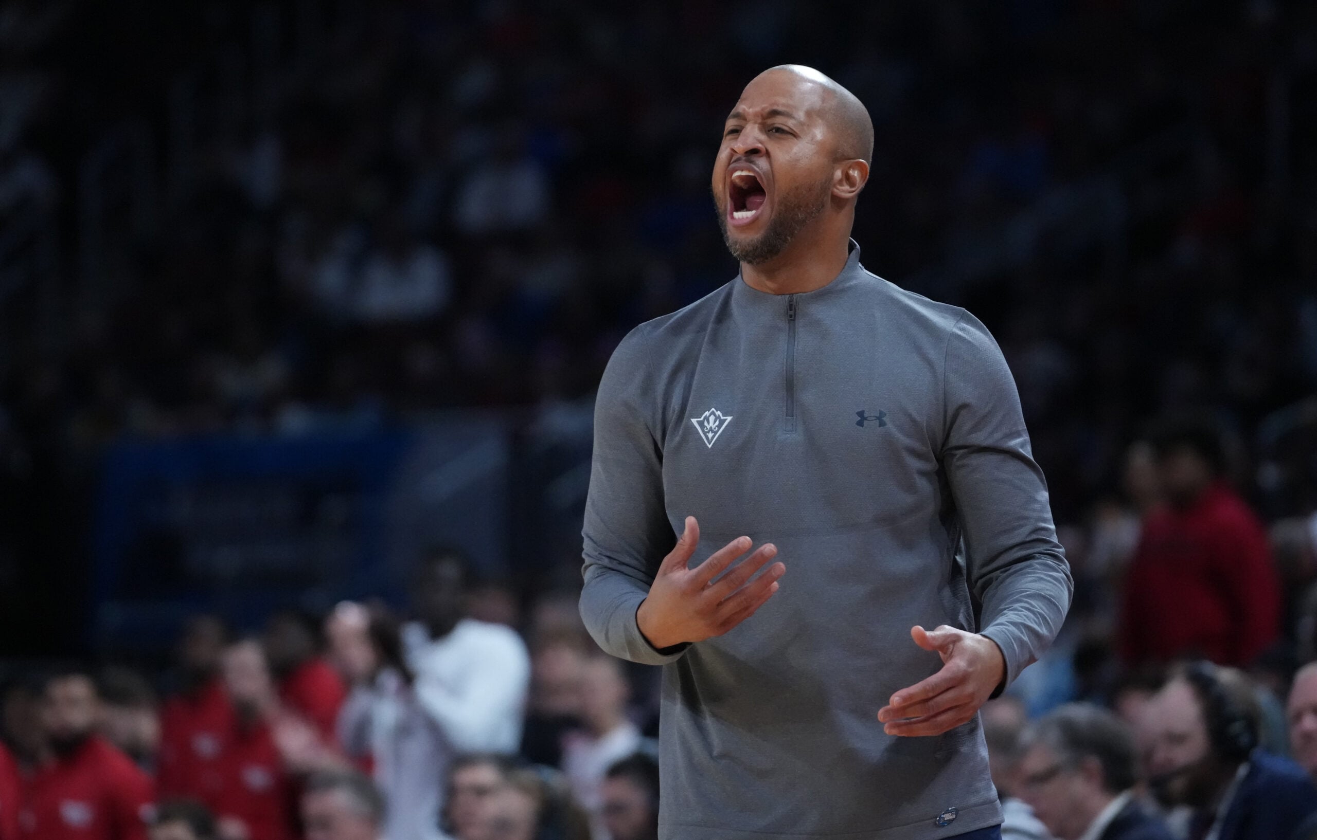 Mar 20, 2025; Wichita, KS, USA; North Carolina-Wilmington Seahawks head coach Takayo Siddle in the first half of a first round men’s NCAA Tournament game against the Texas Tech Red Raiders at Intrust Bank Arena. Mandatory Credit: Kirby Lee-Imagn Images