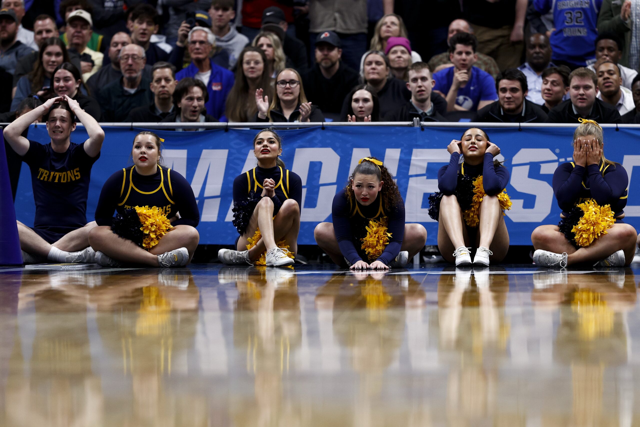 March 20, 2025; Denver, CO, USA; UC San Diego Tritons cheerleaders reacts during the second half against the Michigan Wolverines at Ball Arena. Mandatory Credit: Isaiah J. Downing-Imagn Images