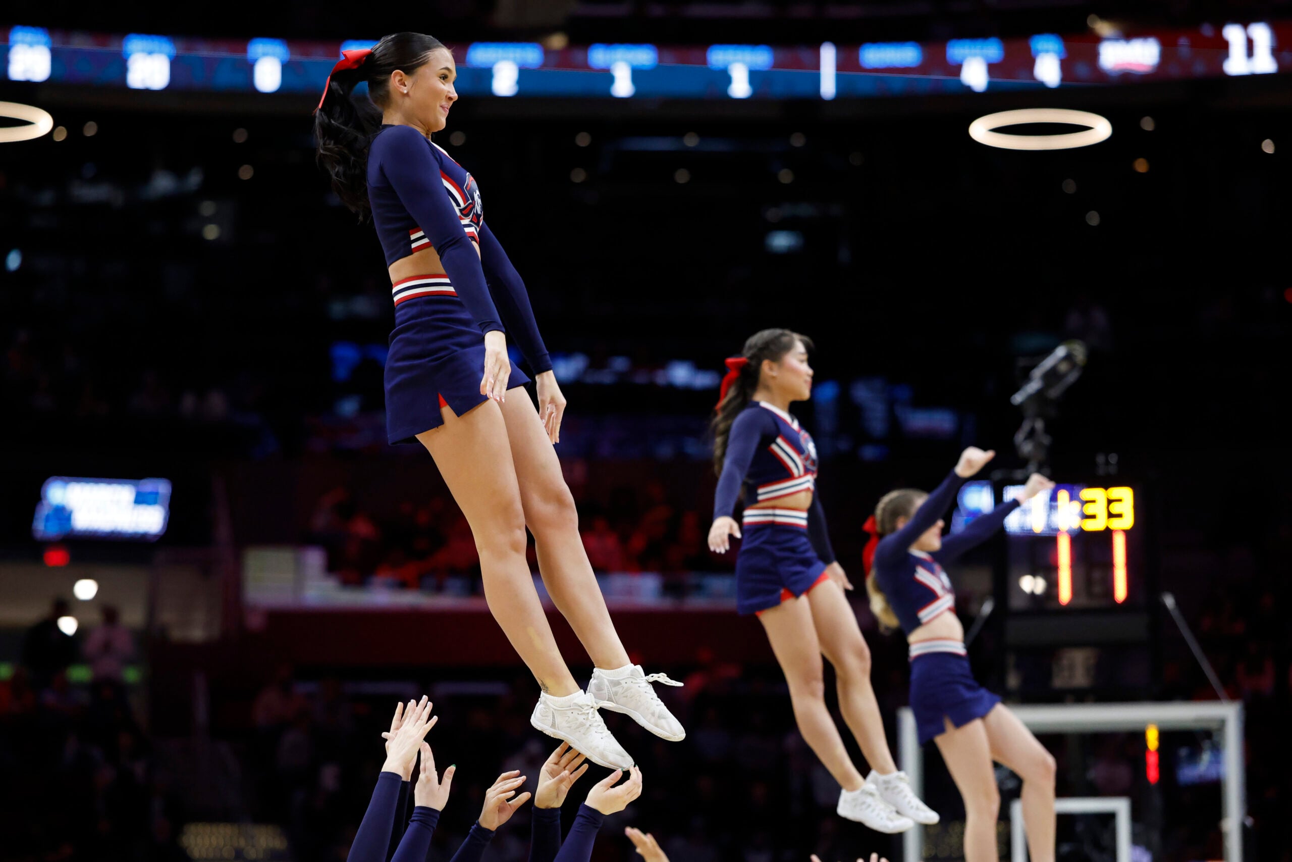 Mar 21, 2025; Cleveland, OH, USA; Robert Morris Colonials cheerleaders perform in the first half against the Alabama Crimson Tide during the NCAA Tournament First Round at Rocket Arena. Mandatory Credit: Rick Osentoski-Imagn Images