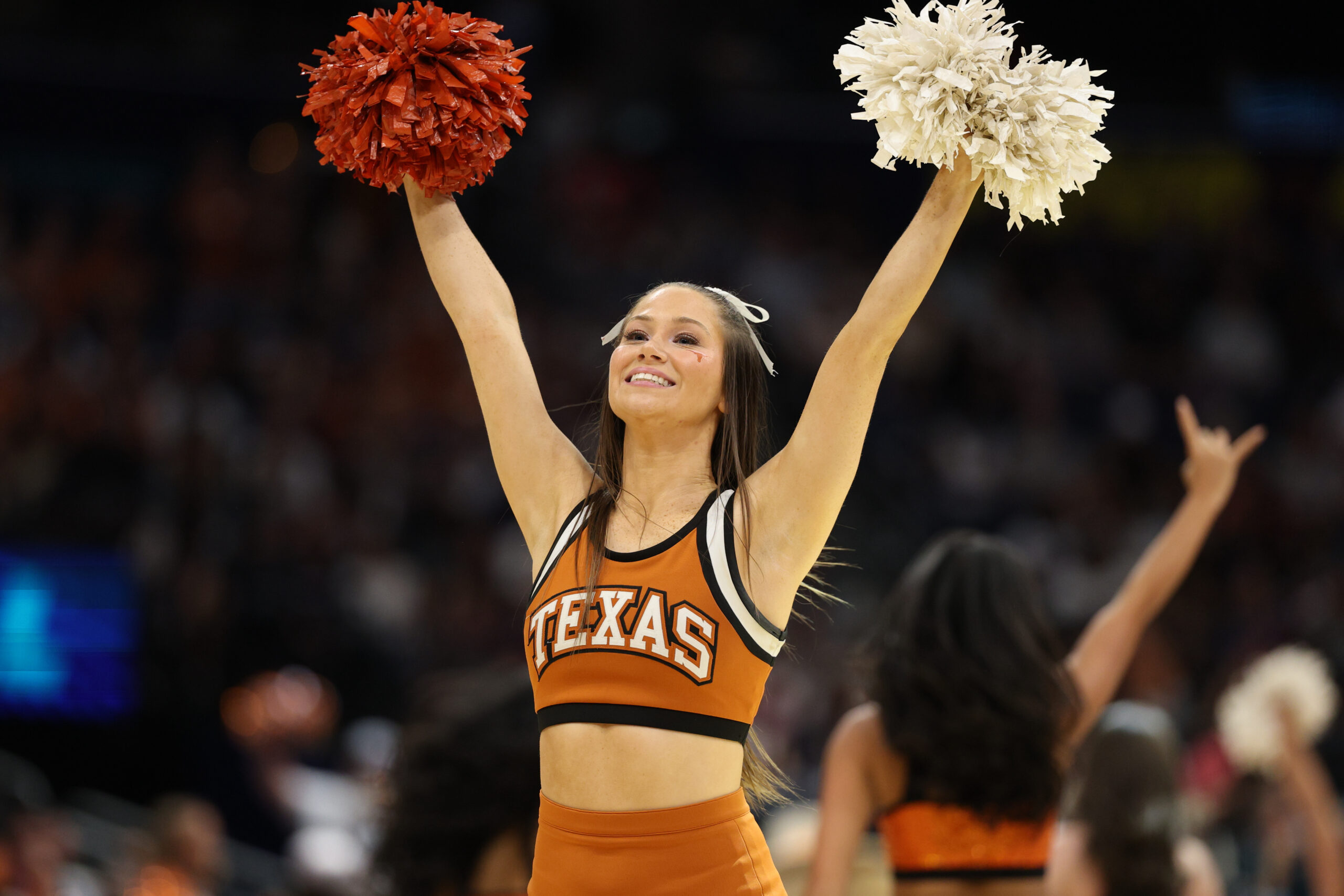 Apr 4, 2025; Tampa, FL, USA;  The Texas Longhorns cheerleaders perform during the third quarter in a semifinal of the women's 2025 NCAA tournament against the South Carolina Gamecocks at Amalie Arena. Mandatory Credit: Nathan Ray Seebeck-Imagn Images