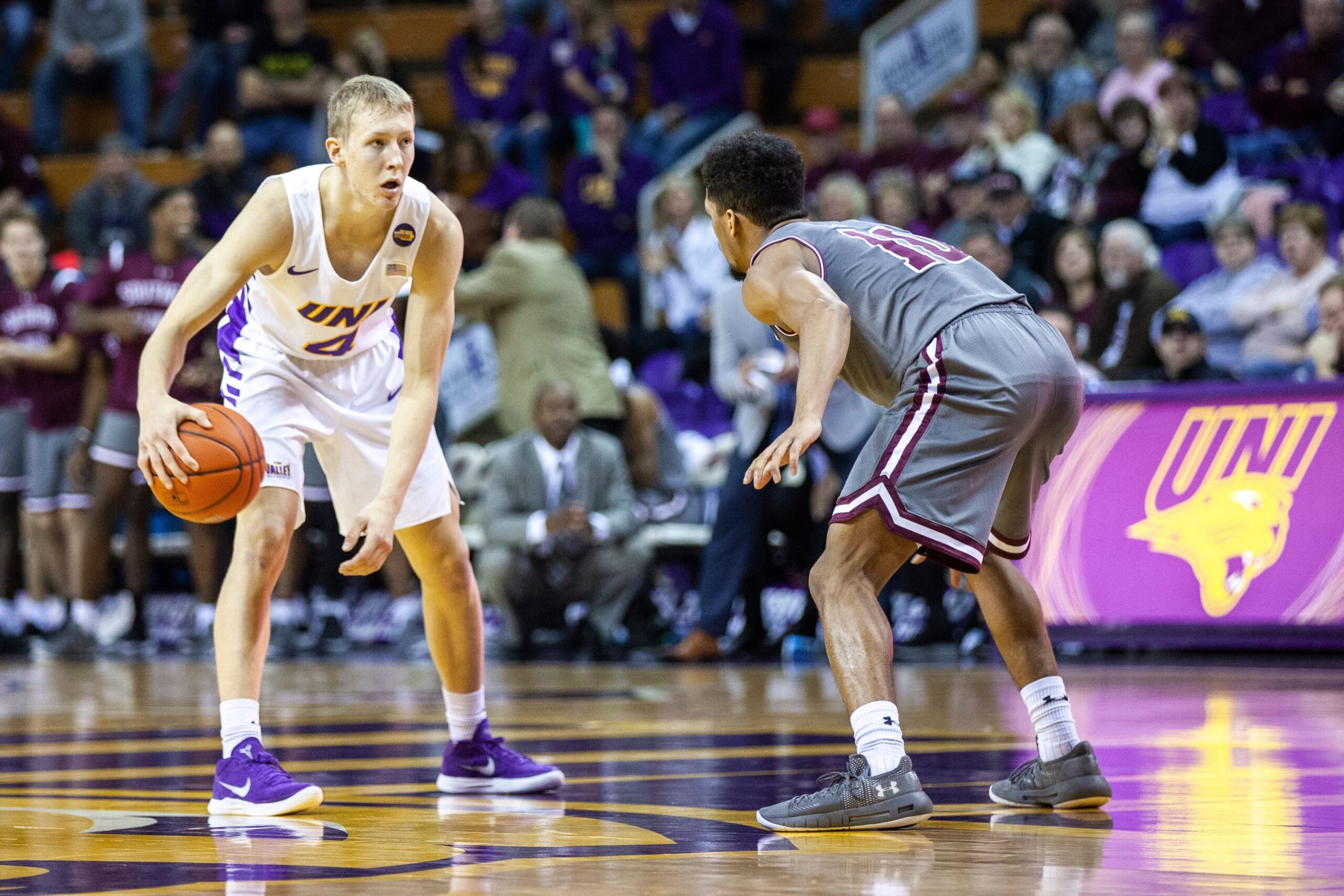 Northern Iowa guard A.J. Green looks around the court while being defended by Southern Illinois guard Aaron Cook (10) during a NCAA Missouri Valley Conference men's basketball game on Saturday, Jan. 5, 2019, at the McLeod Center in Cedar Falls, Iowa.
190105 Uni S Illinois 028 Jpg