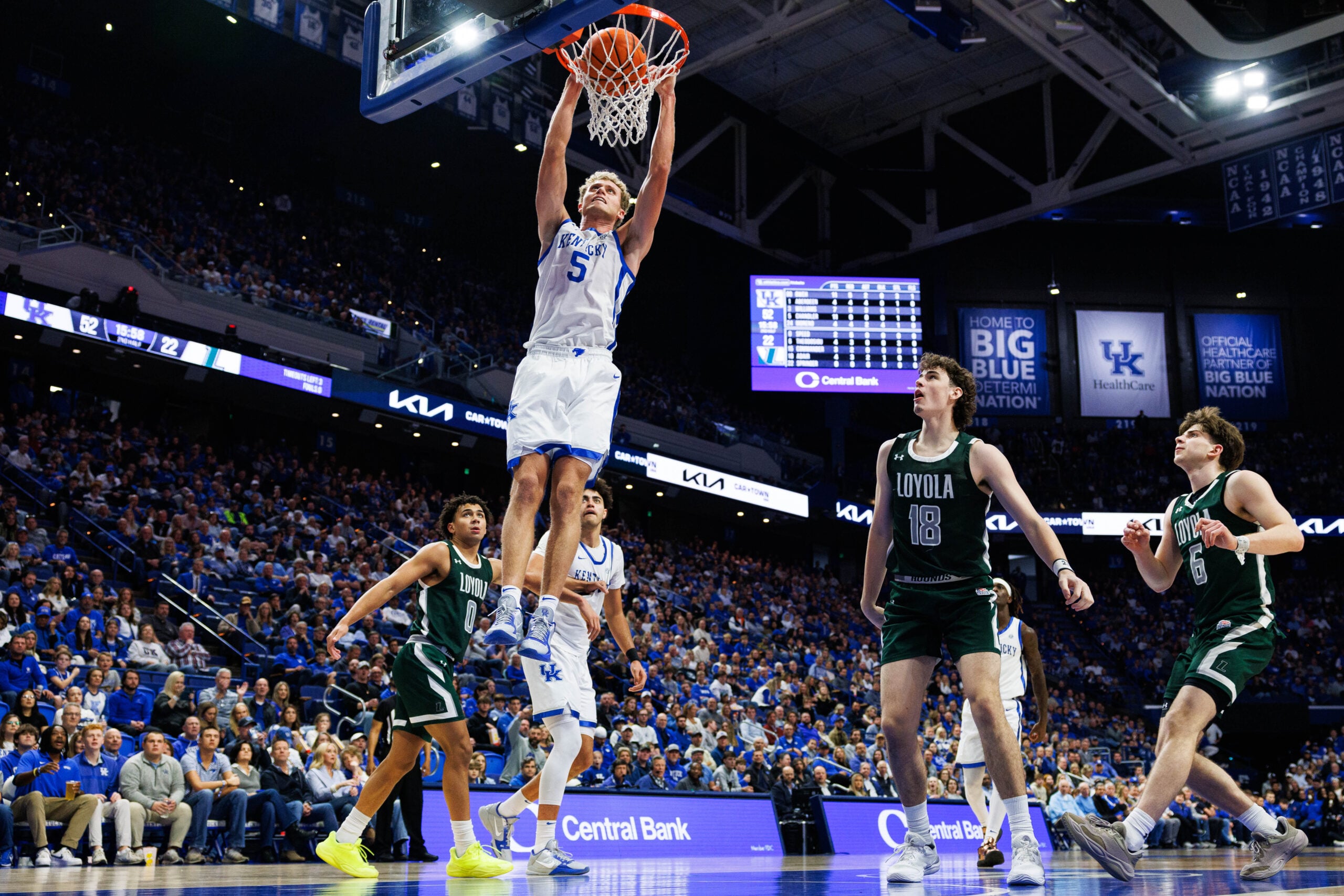 Nov 21, 2025; Lexington, Kentucky, USA; Kentucky Wildcats guard Collin Chandler (5) dunks the ball during the second half against the Loyola (MD) Greyhounds at Rupp Arena at Central Bank Center. Mandatory Credit: Jordan Prather-Imagn Images