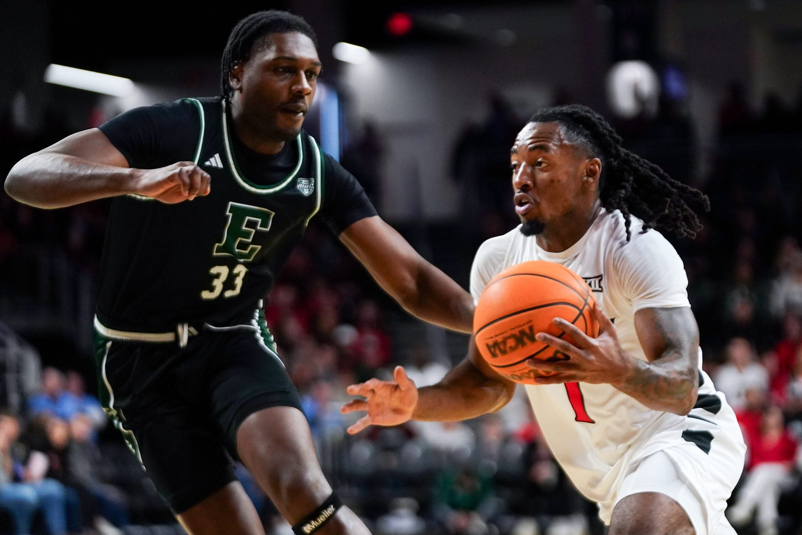 Cincinnati Bearcats guard Day Day Thomas (1) drives the ball to the basket in the first half of a NCAA men’s basketball game between the Cincinnati Bearcats and Eastern Michigan Eagles, Wednesday, Nov. 26, 2025, at Fifth Third Arena in Cincinnati.