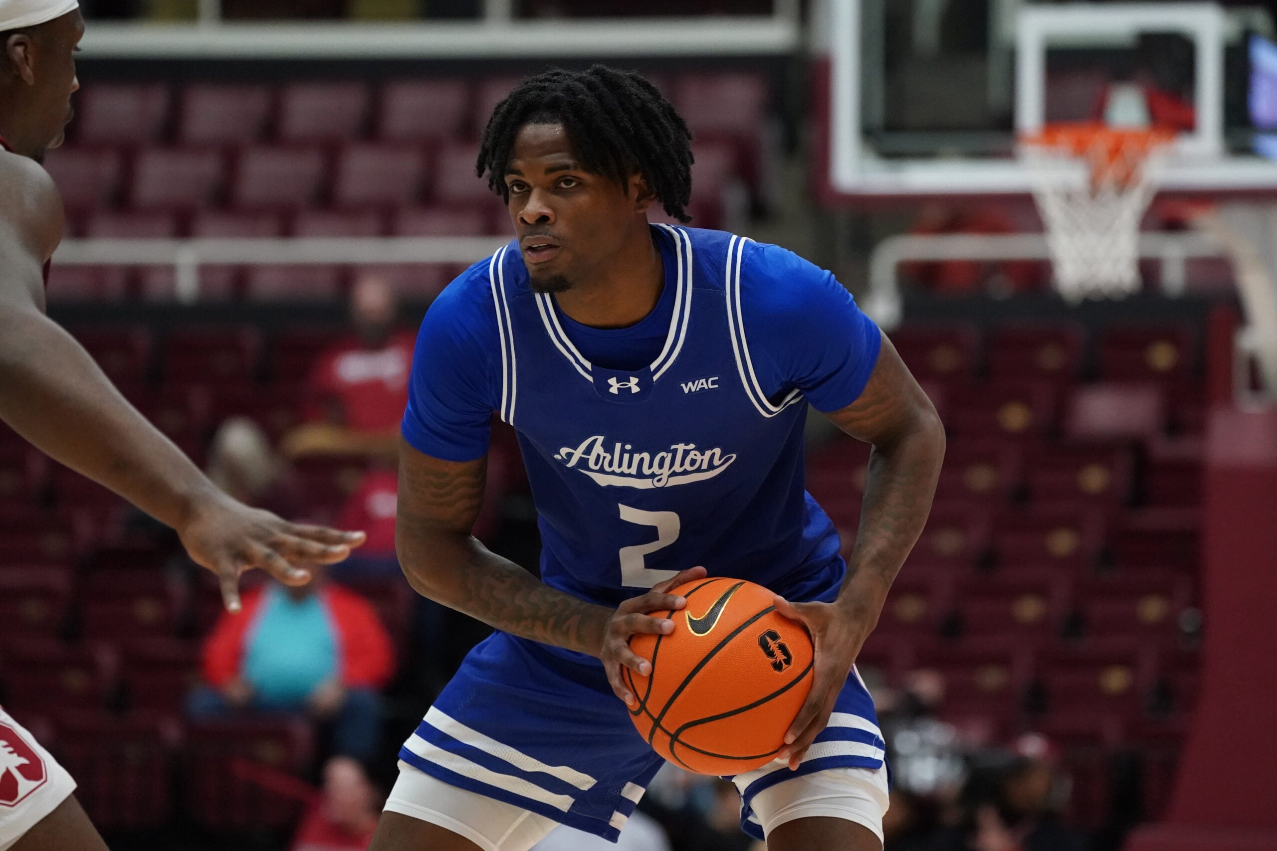 Dec 17, 2025; Stanford, California, USA;  Texas-Arlington Mavericks forward Raysean Seamster (2) looks to pass against the Stanford Cardinal in the first half at Maples Pavilion. Mandatory Credit: David Gonzales-Imagn Images